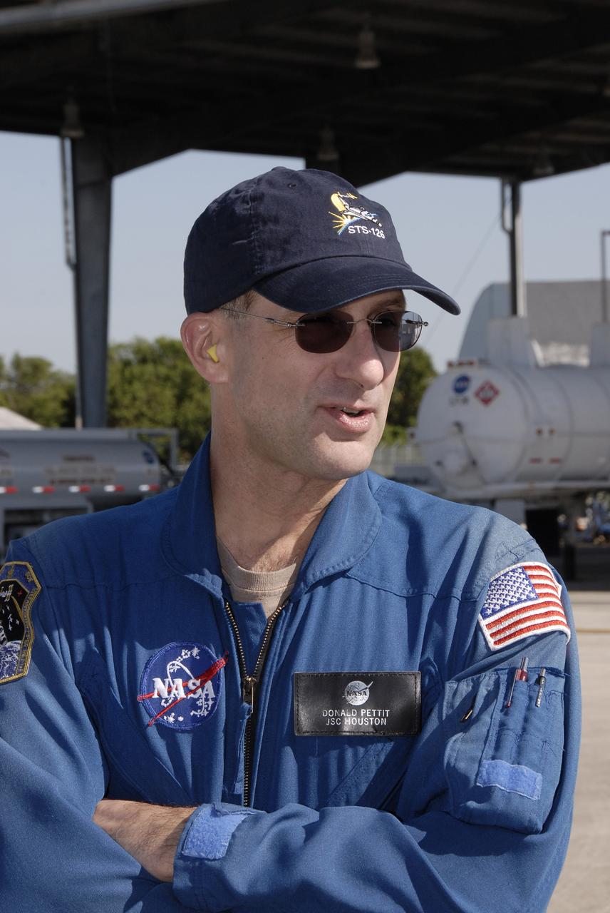 CAPE CANAVERAL, Fla. - STS-126 Mission Specialist Donald Pettit arrives at the Shuttle Landing Facility at NASA’s Kennedy Space Center in Florida for Terminal Countdown Demonstration Test, or TCDT, activities. During TCDT, Endeavour's astronauts and launch teams will participate in a simulated countdown, practice emergency exit procedures at the launch pad and continue to familiarize themselves with the mission payload and hardware. On this 27th mission to the International Space Station, Endeavour will carry the Lightweight Multi-Purpose Experiment Support Structure Carrier and the Multi-Purpose Logistics Module Leonardo that will hold supplies and equipment, including additional crew quarters, additional exercise equipment, spare hardware and equipment for the regenerative life support system. Endeavour is targeted to launch at 7:55 p.m. EST on Nov. 14. Photo credit: NASA/Kim Shiflett