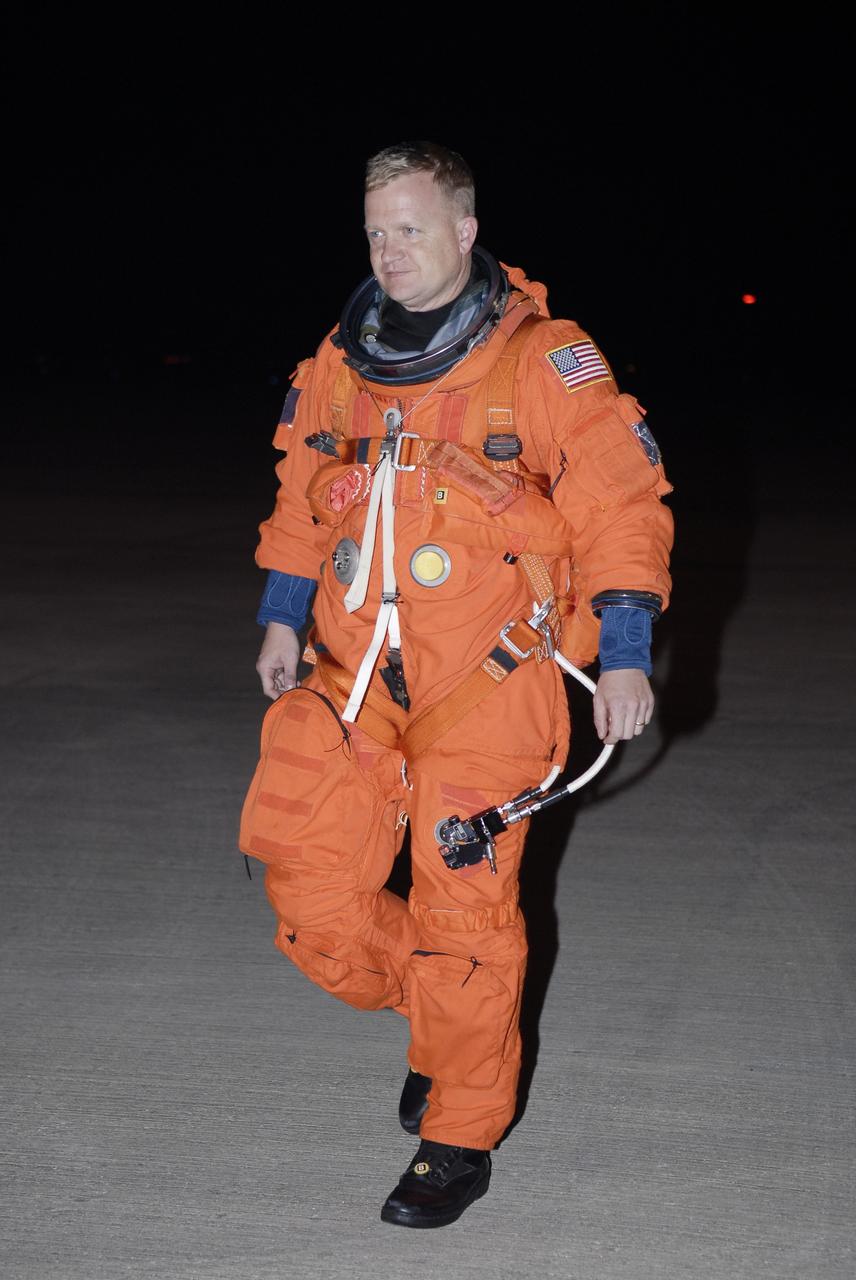 CAPE CANAVERAL, Fla. - At NASA's Kennedy Space Center in Florida, STS-126 Pilot Eric Boe walks away from the Shuttle Training Aircraft, or STA, after practicing shuttle landings. The STA is a Grumman American Aviation-built Gulf Stream II jet that was modified to simulate a shuttle’s cockpit, motion and visual cues, and handling qualities. In flight, the aircraft duplicates the shuttle’s atmospheric descent trajectory from approximately 35,000 feet to landing. The practice is part of the Terminal Countdown Demonstration Test, which includes equipment familiarization, emergency exit procedures and a simulated launch countdown. On the STS-126 mission, space shuttle Endeavour's crew will deliver equipment and supplies to the International Space Station in preparation for expansion from a three- to six-person resident crew aboard the complex. The mission also will include four spacewalks to service the station’s Solar Alpha Rotary Joints. Endeavour is targeted to launch Nov. 14. Photo credit: NASA/Kim Shiflett