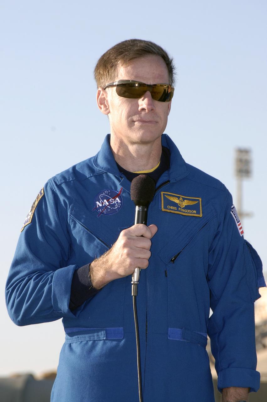 CAPE CANAVERAL, Fla. -   On Launch Pad 39A at NASA's Kennedy Space Center in Florida, STS-126 Commander Chris Ferguson listens to a question from the media about the mission.  The crew is at Kennedy to take part in the Terminal Countdown Demonstration Test, which includes equipment familiarization, emergency exit procedures and a simulated launch countdown.  On the STS-126 mission, space shuttle Endeavour's crew will deliver equipment and supplies to the International Space Station in preparation for expansion from a three- to six-person resident crew aboard the complex. The mission also will include four spacewalks to service the station’s Solar Alpha Rotary Joints. Endeavour is targeted to launch Nov. 14.  Photo credit: NASA/Kim Shiflett