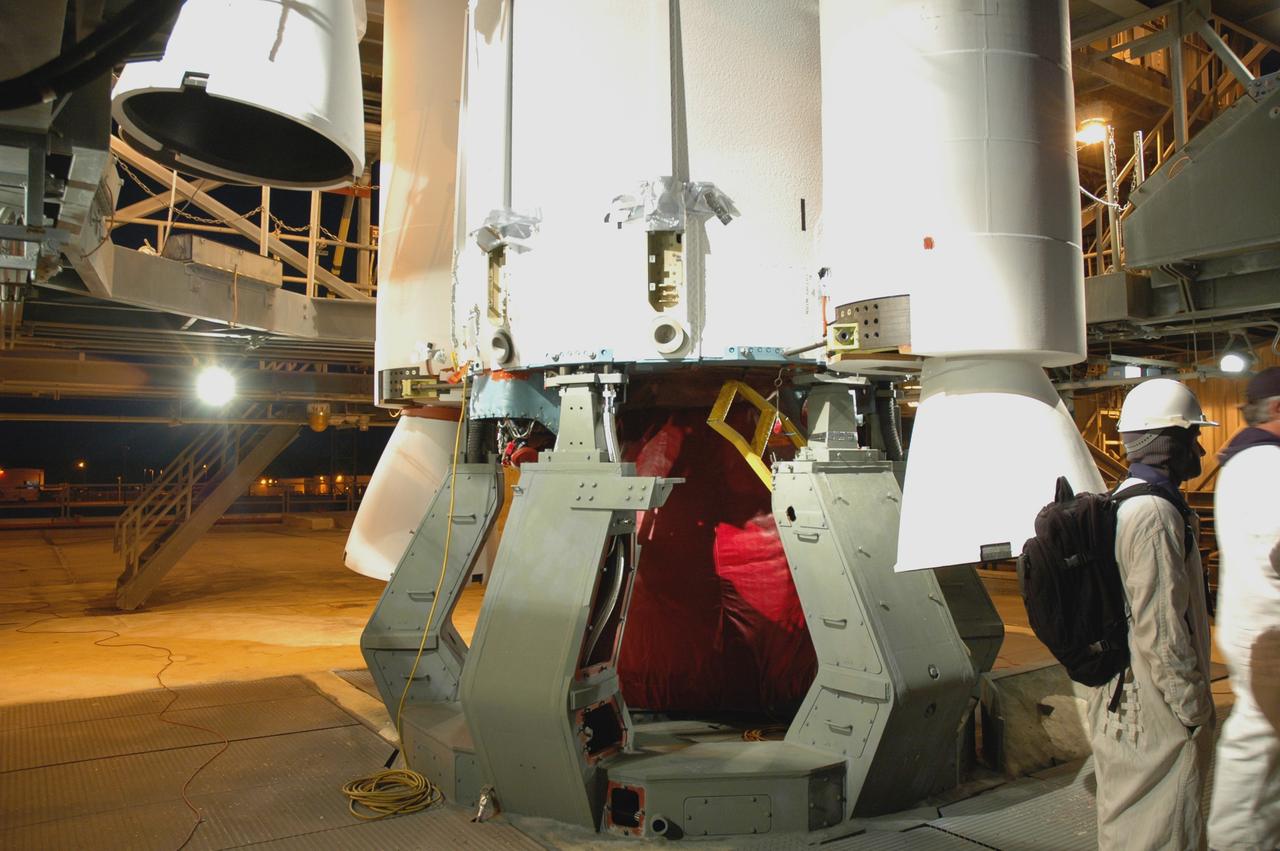 CAPE CANAVERAL, Fla. – On Launch Pad 17-B at Cape Canaveral Air Force Station in Florida, workers prepare the air-lit strap-on solid rocket boosters to be mated onto the Delta 2 launch vehicle that will carry the Kepler spacecraft into orbit. The Kepler mission is specifically designed to survey our region of the Milky Way galaxy to discover hundreds of Earth-size and smaller planets in or near the habitable zone and determine how many of the billions of stars in our galaxy have such planets. Results from this mission will allow us to place our solar system within the continuum of planetary systems in the Galaxy. NASA's planet-hunting Kepler mission is scheduled to launch no earlier than March 5, 2009. Photo credit: NASA/Jim Grossmann