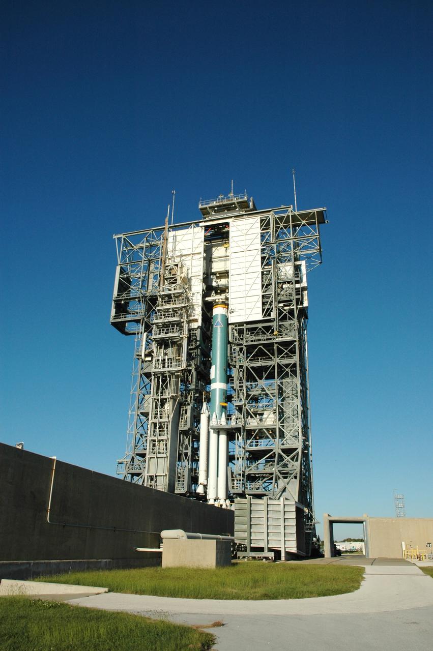 CAPE CANAVERAL, Fla. – On Launch Pad 17-B at Cape Canaveral Air Force Station in Florida, air-lit strap-on solid rocket boosters are being added to the first stage of the Delta 2 launch vehicle (seen here) that will carry the Kepler spacecraft into orbit. The Kepler mission is specifically designed to survey our region of the Milky Way galaxy to discover hundreds of Earth-size and smaller planets in or near the habitable zone and determine how many of the billions of stars in our galaxy have such planets. Results from this mission will allow us to place our solar system within the continuum of planetary systems in the Galaxy. NASA's planet-hunting Kepler mission is scheduled to launch no earlier than March 5, 2009. Photo credit: NASA/Jim Grossmann