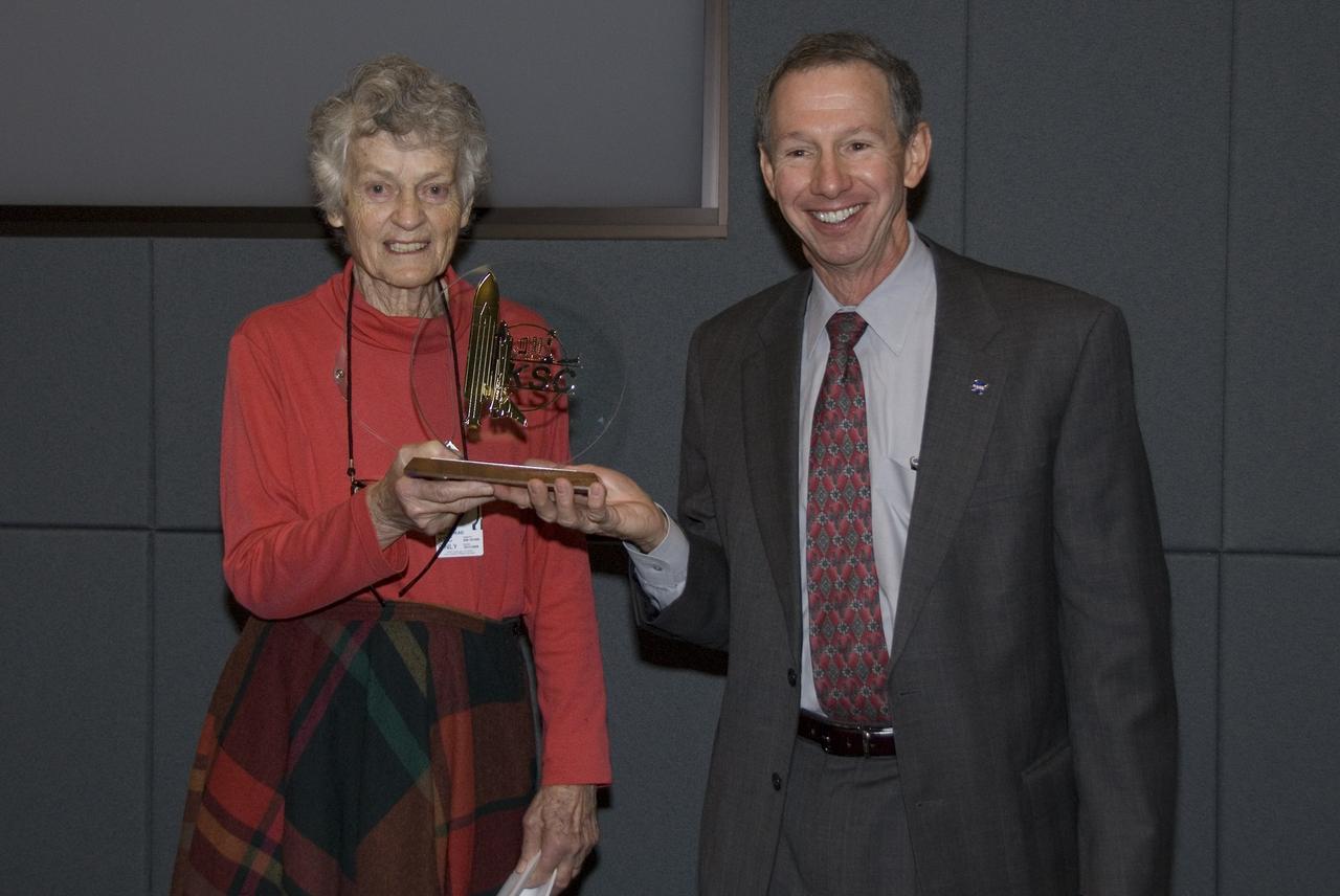 CAPE CANAVERAL, Fla. –  Virginia Whitehead receives NASA’s Lifetime Achievement Award from Mike Griffin at a ceremony shortly before the STS-126 Flight Readiness Review at the OSB II on Oct. 30. Whitehead has worked at NASA's Kennedy Space Center for 34 years.