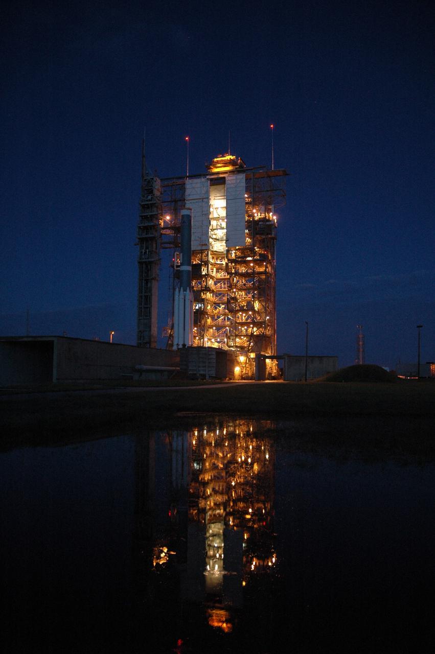 CAPE CANAVERAL, Fla. – Just before dawn on Launch Pad 17-B at Cape Canaveral Air Force Station in Florida, the first stage of the Delta 2 launch vehicle that will carry the Kepler spacecraft into orbit waits for the installation of the final solid rocket boosters. The Kepler mission is specifically designed to survey our region of the Milky Way galaxy to discover hundreds of Earth-size and smaller planets in or near the habitable zone and determine how many of the billions of stars in our galaxy have such planets. Results from this mission will allow us to place our solar system within the continuum of planetary systems in the Galaxy. NASA's planet-hunting Kepler mission is scheduled to launch no earlier than March 5, 2009. Photo credit: NASA/Jim Grossmann