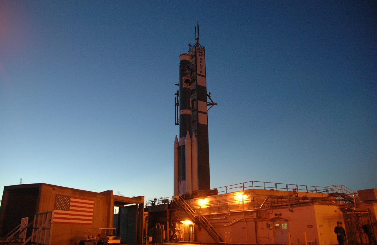 CAPE CANAVERAL, Fla. – As dawn lights the sky on Launch Pad 17-B at Cape Canaveral Air Force Station in Florida, the first stage of the Delta 2 launch vehicle that will carry the Kepler spacecraft into orbit waits for the installation of the final solid rocket boosters. The Kepler mission is specifically designed to survey our region of the Milky Way galaxy to discover hundreds of Earth-size and smaller planets in or near the habitable zone and determine how many of the billions of stars in our galaxy have such planets. Results from this mission will allow us to place our solar system within the continuum of planetary systems in the Galaxy. NASA's planet-hunting Kepler mission is scheduled to launch no earlier than March 5, 2009. Photo credit: NASA/Jim Grossmann