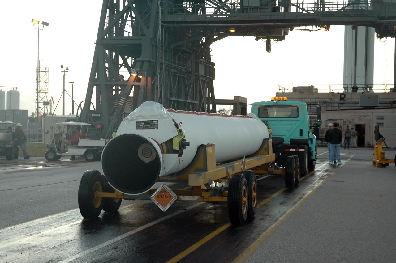 CAPE CANAVERAL, Fla. – On Launch Pad 17-B at Cape Canaveral Air Force Station in Florida, one of the final solid rocket boosters arrives for installation on the first stage of the Delta 2 launch vehicle that will carry the Kepler spacecraft into orbit. The Kepler mission is specifically designed to survey our region of the Milky Way galaxy to discover hundreds of Earth-size and smaller planets in or near the habitable zone and determine how many of the billions of stars in our galaxy have such planets. Results from this mission will allow us to place our solar system within the continuum of planetary systems in the Galaxy. NASA's planet-hunting Kepler mission is scheduled to launch no earlier than March 5, 2009. Photo credit: NASA/Jim Grossmann