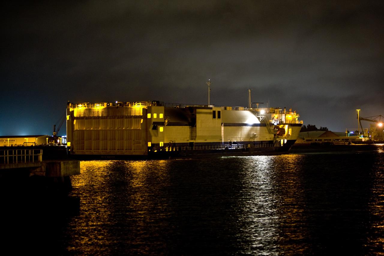 CAPE CANAVERAL, Fla. – The Delta Mariner arrives at Port Canaveral, Fla., with its cargo of the Ares I-X upper stage simulator segments. The upper stage simulator will be used in the test flight identified as Ares I-X in 2009. The segments will simulate the mass and the outer mold line and will be more than 100 feet of the total vehicle height of 327 feet. The simulator comprises 11 segments that are approximately 18 feet in diameter. Most of the segments will be approximately 10 feet high, ranging in weight from 18,000 to 60,000 pounds, for a total of approximately 450,000 pounds. Photo credit: NASA/Dimitri Gerondidakis