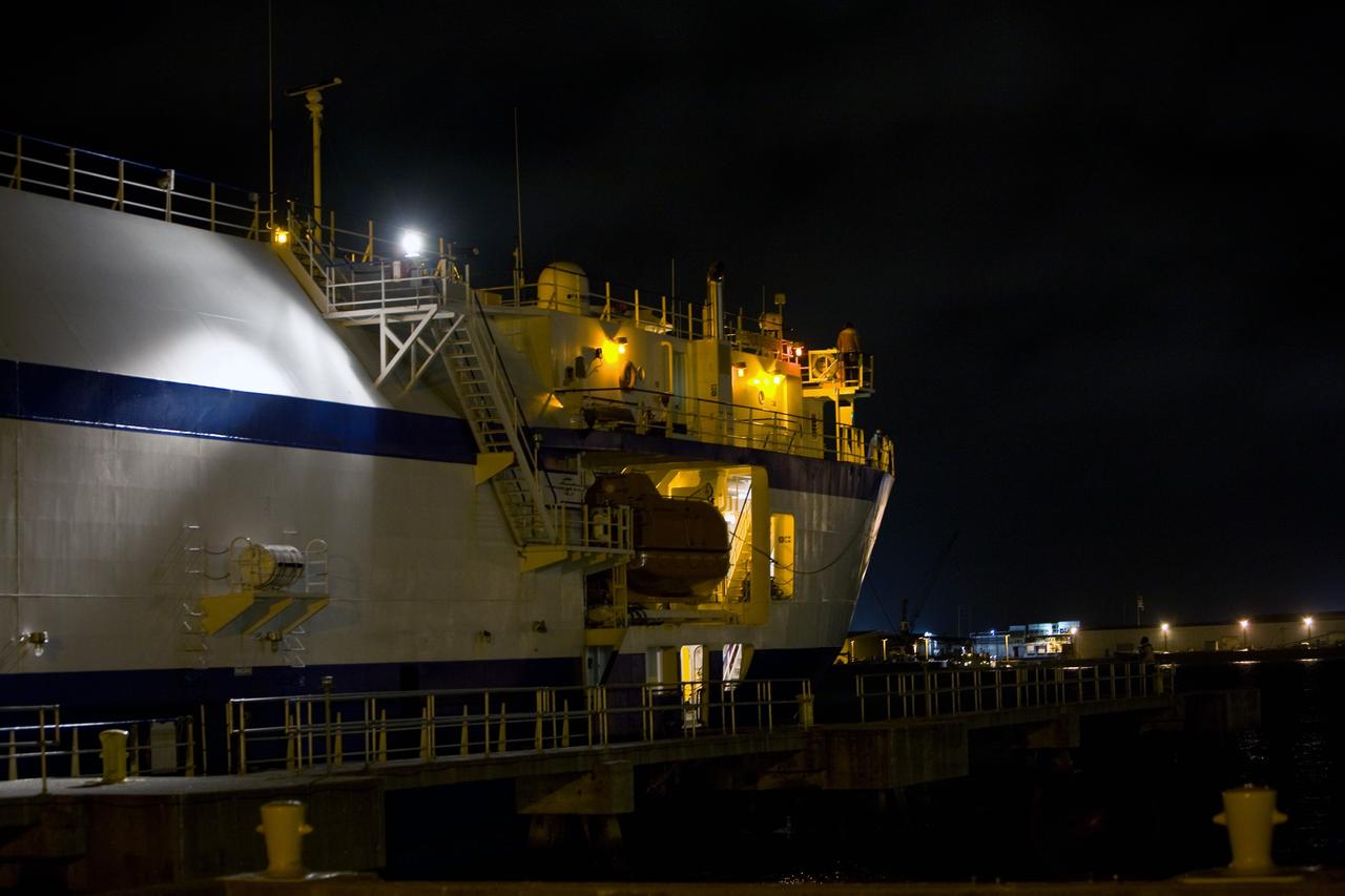 CAPE CANAVERAL, Fla. – The Delta Mariner arrives at Port Canaveral, Fla., with its cargo of the Ares I-X upper stage simulator segments. The upper stage simulator will be used in the test flight identified as Ares I-X in 2009. The segments will simulate the mass and the outer mold line and will be more than 100 feet of the total vehicle height of 327 feet. The simulator comprises 11 segments that are approximately 18 feet in diameter. Most of the segments will be approximately 10 feet high, ranging in weight from 18,000 to 60,000 pounds, for a total of approximately 450,000 pounds. Photo credit: NASA/Dimitri Gerondidakis