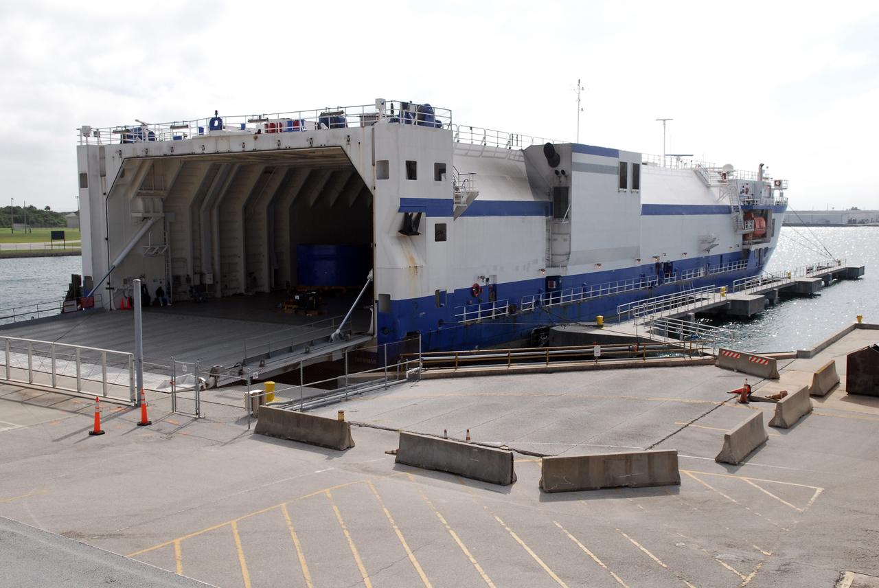 CAPE CANAVERAL, Fla. –  The Delta Mariner is docked at Port Canaveral, Fla., with its cargo of the Ares I-X upper stage simulator segments. The upper stage simulator will be used in the test flight identified as Ares I-X in 2009.  The segments will simulate the mass and the outer mold line and will be more than 100 feet of the total vehicle height of 327 feet.  The simulator comprises 11 segments that are approximately 18 feet in diameter.  Most of the segments will be approximately 10 feet high, ranging in weight from 18,000 to 60,000 pounds, for a total of approximately 450,000 pounds.  Photo credit: NASA/Dimitri Gerondidakis