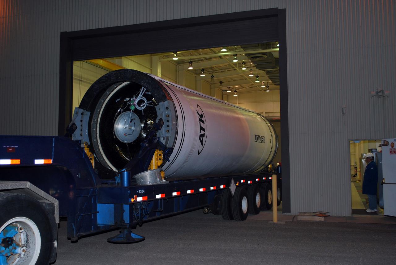 VANDENBERG AIR FORCE BASE, Calif. –  The Taurus XL Stage 0 motor is moved into Orbital Sciences' Hangar 1555 at Vandenberg Air Force Base in California.  The Taurus XL will launch NASA's Orbiting Carbon Observatory, or OCO, spacecraft targeted for Jan. 15.  The OCO is a new Earth-orbiting mission sponsored by NASA's Earth System Science Pathfinder Program. Photo credit: NASA/Randy Beaudoin, VAFB