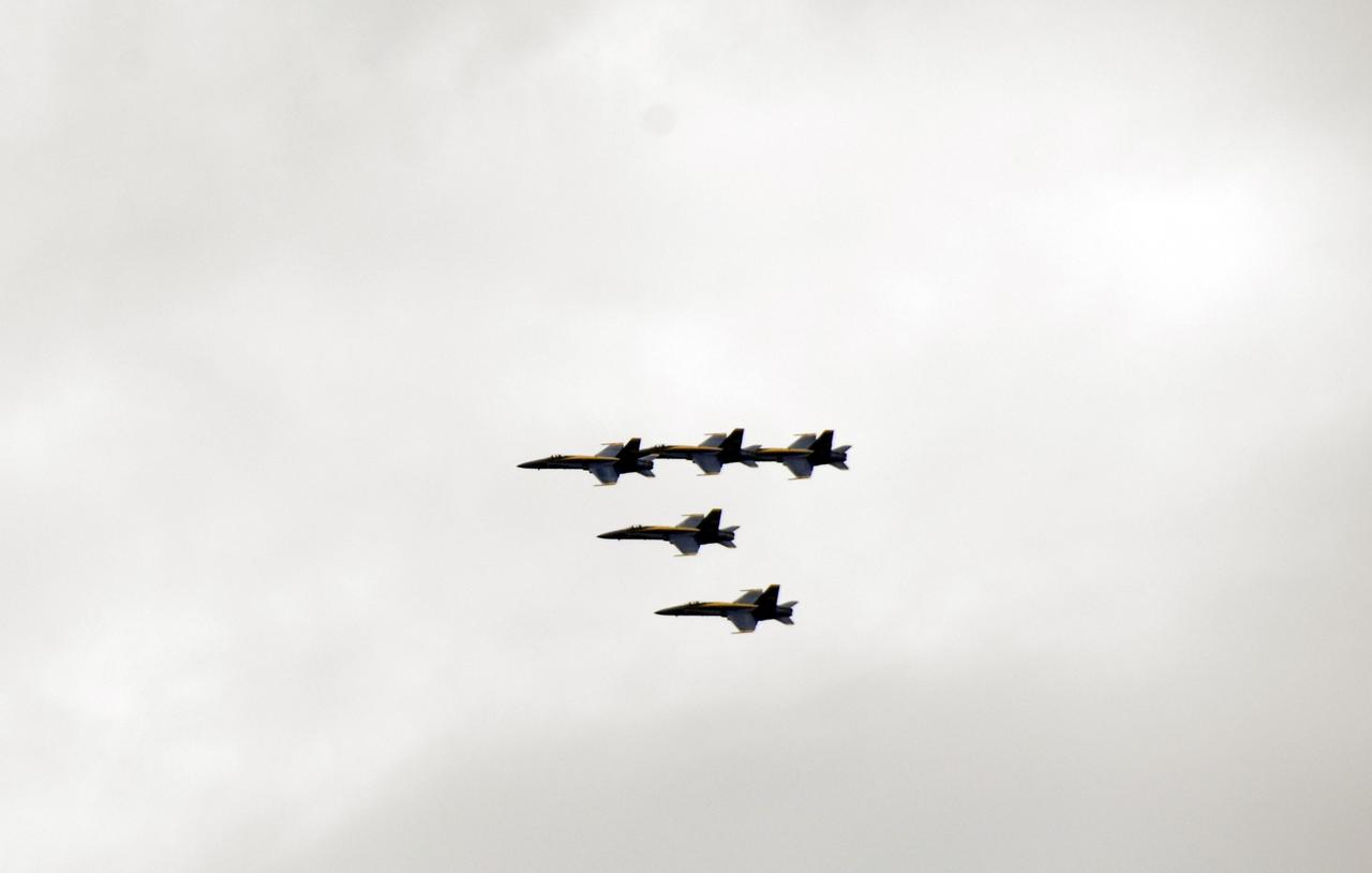 CAPE CANAVERAL, Fla. –   The U.S. Navy's Blue Angels approach the Shuttle Landing Facility for a landing at  NASA's Kennedy Space Center in Florida.  They will perform at the Kennedy Space Center Visitor Complex Space and Air Show Nov. 8-9. The Navy's elite flight demonstration squadron will take to the skies in military aircraft demonstrations by the F-16 Fighting Falcon and F/A-18 Super Hornet jets for the second annual Space & Air Show at Kennedy. This year’s show brings together the best in military aircraft, coupled with precision pilots and veteran astronauts to celebrate spaceflight and aviation. The event includes military aircraft demonstrations by the F-16 Fighting Falcon and a water rescue demonstration by the 920th Rescue Wing. Photo credit: NASA/Kim Shiflett