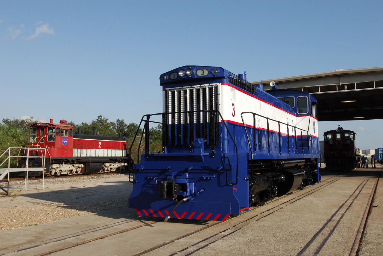 CAPE CANAVERAL, Fla. –    At NASA's Kennedy Space Center in Florida, NASA Railroad locomotive 3 has been repainted. The Railroad Operation and Maintenance Team at Kennedy completed the refurbishment of locomotive 3 in October.  The 15-month process, including a new paint scheme, dealt with extensive corrosion to the locomotive because of Kennedy's proximity to the Atlantic Ocean.  Locomotives 1 and 2 also will be refurbished eventually.  The NASA Railroad locomotives are SW-1500 switch engines built by Electro Motive Diesel (EMD).  Photo credit:  NASA/Amanda Diller