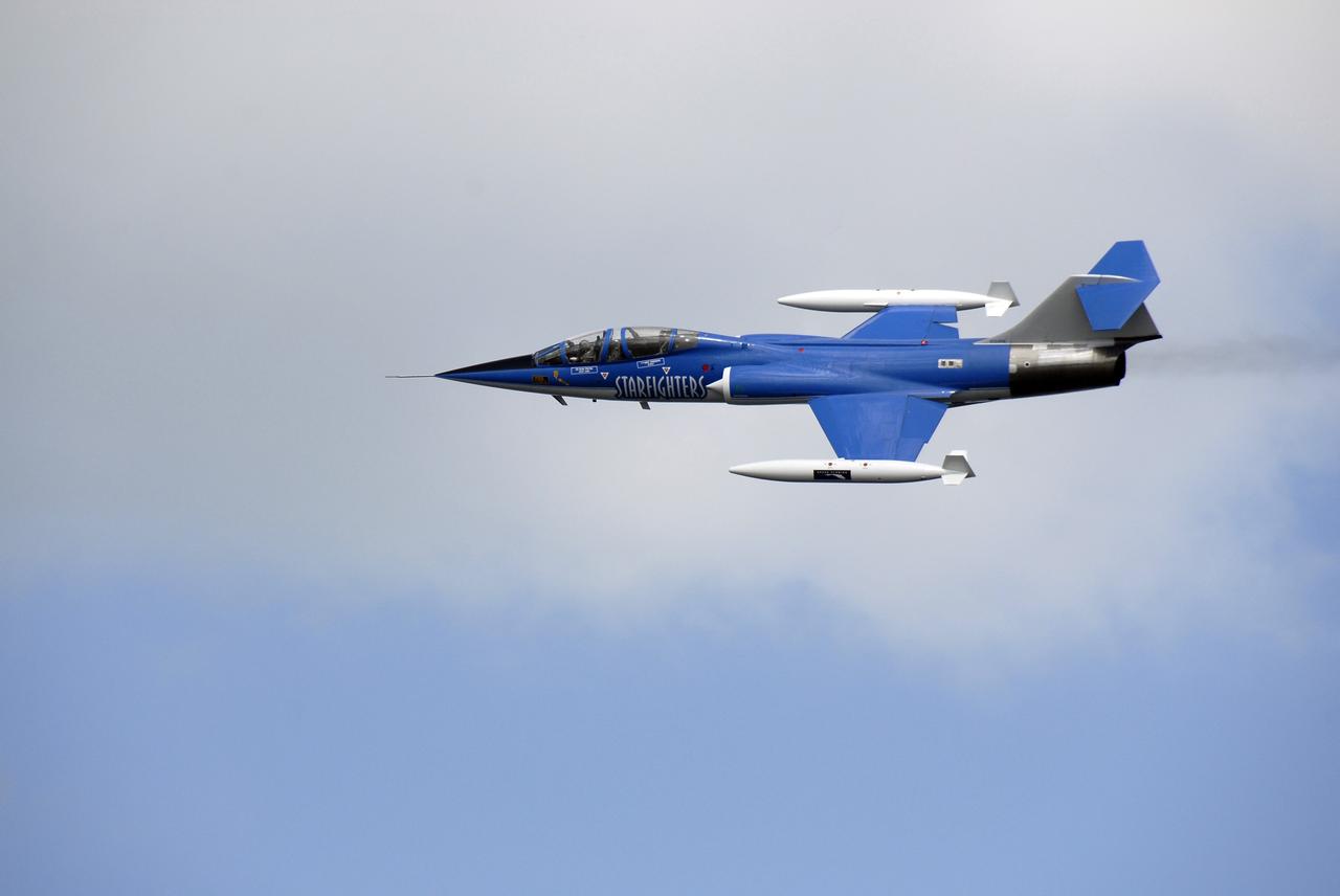 CAPE CANAVERAL, Fla. –   An F-104G Starfighter races through the sky over NASA's Kennedy Space Center in Florida during the Kennedy Space Center Visitor Complex Space and Air Show Nov. 8-9.  This year’s show brought together the best in military aircraft, such as the F/A-18 Super Hornet and F-16 Fighting Falcon, coupled with precision pilots and veteran astronauts to celebrate spaceflight and aviation. The event included a water rescue demonstration by the 920th Rescue Wing.  Photo credit: NASA/Kim Shiflett