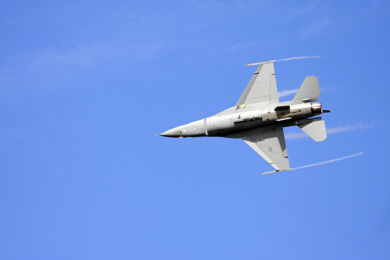 CAPE CANAVERAL, Fla. –  During the Kennedy Space Center Visitor Complex Space and Air Show held Nov. 8-9 at NASA's Kennedy Space Center in Florida, this F/A-18 Super Hornet demonstrates its flying capabilities.  This year’s show brought together the best in military aircraft, such as the F/A-18 Super Hornet and F-16 Fighting Falcon, coupled with precision pilots and veteran astronauts to celebrate spaceflight and aviation. The event included a water rescue demonstration by the 920th Rescue Wing.  Photo credit: NASA/Troy Cryder