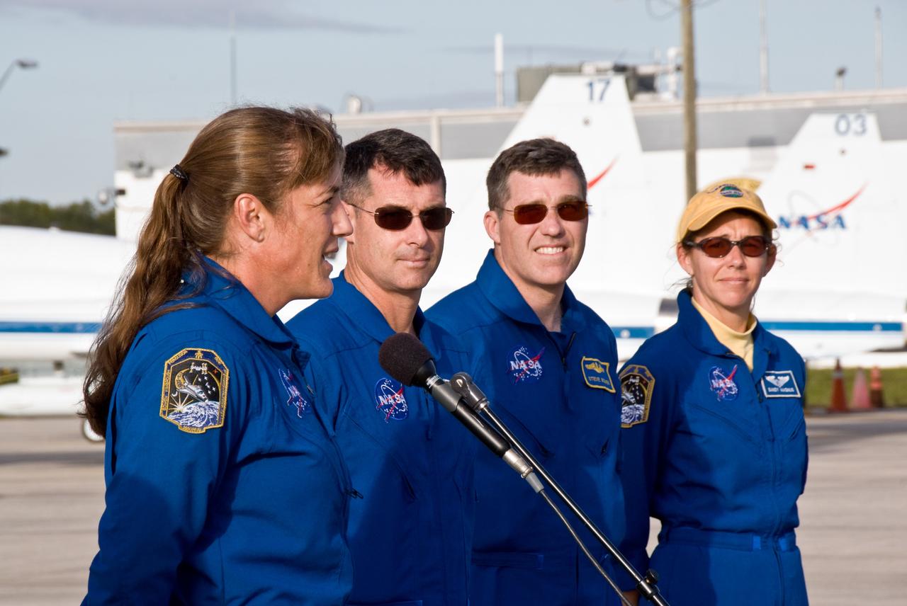 CAPE CANAVERAL, Fla. –   The crew members for the STS-126 mission arrive at NASA's Kennedy Space Center in Florida to prepare for launch.   Mission Specialist Heidemarie Stefanyshyn-Piper describes their fly-in around the launch pad and eagerness to get to the International Space Station. Next to her are Mission Specialists Shane Kimbrough, Steve Bowen and Sandra Magnus.  STS-126 is the 124th space shuttle flight and the 27th flight to the International Space Station. The mission will feature four spacewalks and important repair work and will prepare the space station to house six crew members for long- duration missions.  Liftoff is scheduled for 7:55 p.m. EST Nov. 14. Photo credit: NASA/Kim Shiflett