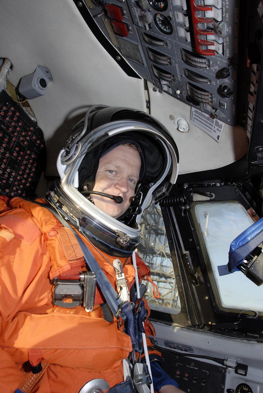 CAPE CANAVERAL, Fla. – Wearing his launch-and-entry suit, STS-126 Pilot Eric Boe is seated in the Shuttle Training Aircraft to practice shuttle landings on the Shuttle Landing Facility's runway at NASA's Kennedy Space Center in Florida. The mission crew members arrived at Kennedy to prepare for launch. STS-126 is the 124th space shuttle flight and the 27th flight to the International Space Station. The 15-day mission will feature four spacewalks and work that will prepare the space station to house six crew members for long- duration missions. Liftoff is scheduled for 7:55 p.m. EST Nov. 14. Photo credit: NASA/Kim Shiflett