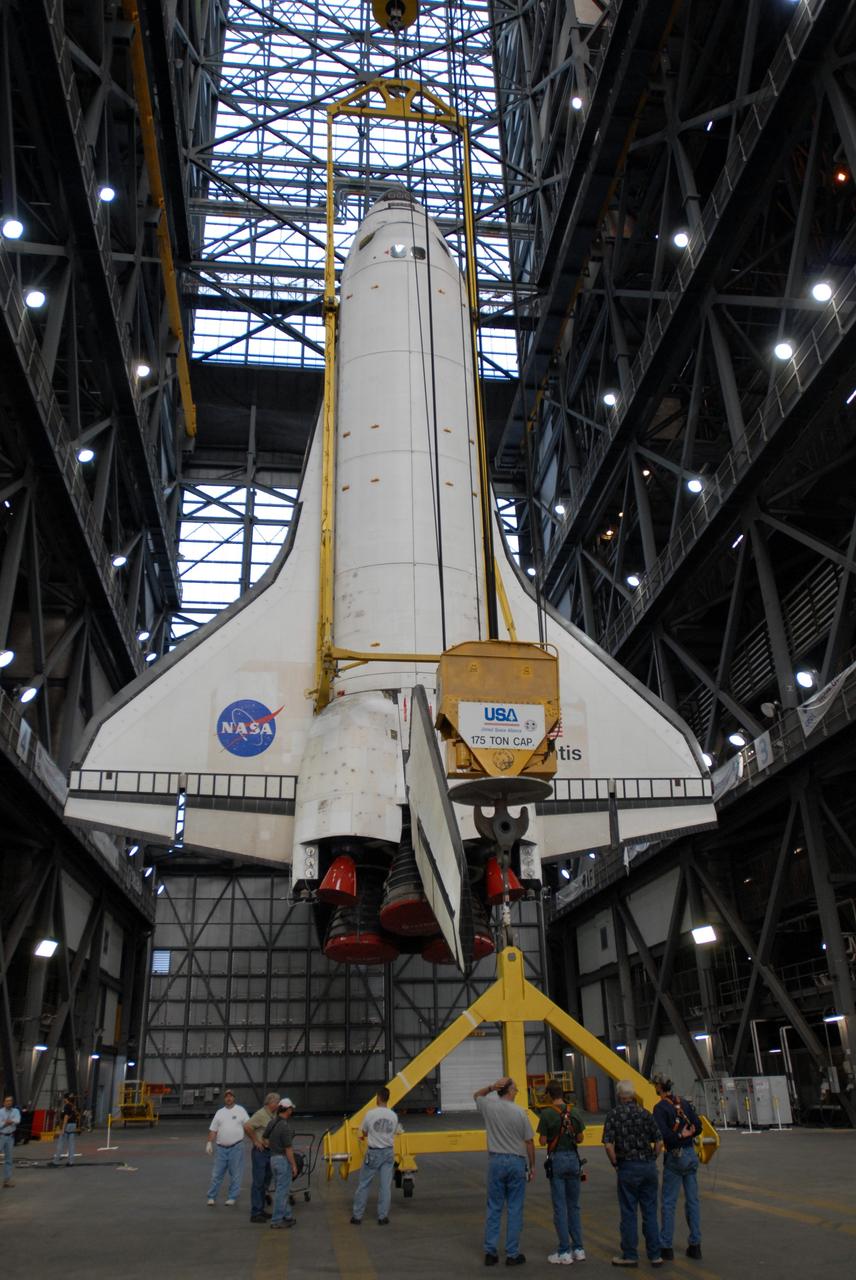 CAPE CANAVERAL, Fla. –  As it hangs suspended in the Vehicle Assembly Building at NASA's Kennedy Space Center in Florida, space shuttle Atlantis is being fitted with an apparatus that will help lower it to a horizontal position.  Atlantis has been taken off its external fuel tank and solid rocket boosters stack after of the delay of its STS-125 mission to NASA's Hubble Space Telescope.  Atlantis will be returned to the Orbiter Processing Facility. Atlantis' targeted launch on Oct. 14 was delayed when a system that transfers science data from the orbiting observatory to Earth malfunctioned on Sept. 27. The new target launch date is under review. Photo credit: NASA/Jim Grossmann