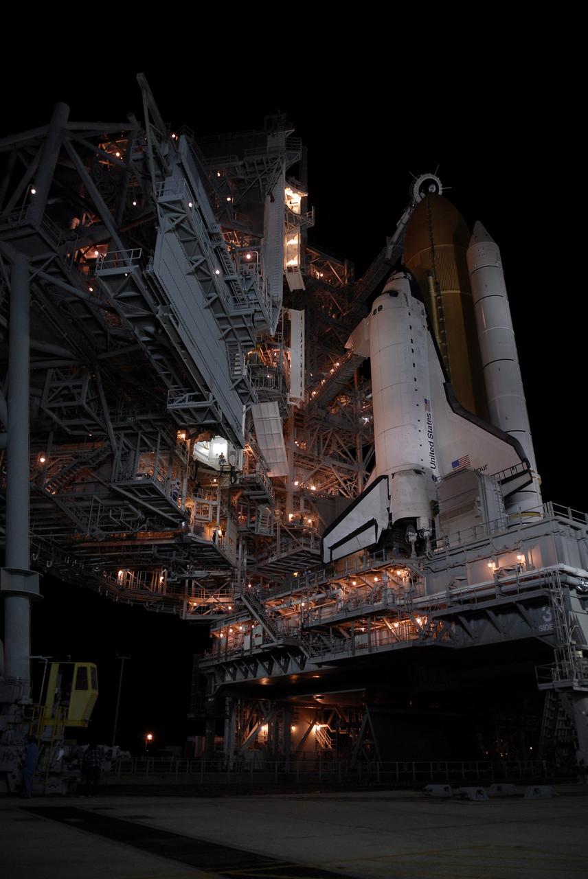 CAPE CANAVERAL, Fla. – On Launch Pad 39A at NASA's Kennedy Space Center in Florida, the orbiter access arm and White Room are extended toward space shuttle Endeavour after rollback of the rotating service structure. The rotating structure provides protected access to the shuttle for changeout and servicing of payloads at the pad. It is supported by a rotating bridge that pivots on a vertical axis on the west side of the pad's flame trench. After the RSS is rolled back, the orbiter is ready for fuel cell activation and external tank cryogenic propellant loading operations. The STS-126 mission will be the 124th space shuttle flight and the 27th flight to the International Space Station. The mission will feature four spacewalks and work that will prepare the space station to house six crew members for long- duration missions. Liftoff is scheduled for 7:55 p.m. EST Nov. 14. Photo credit: NASA/Kim Shiflett