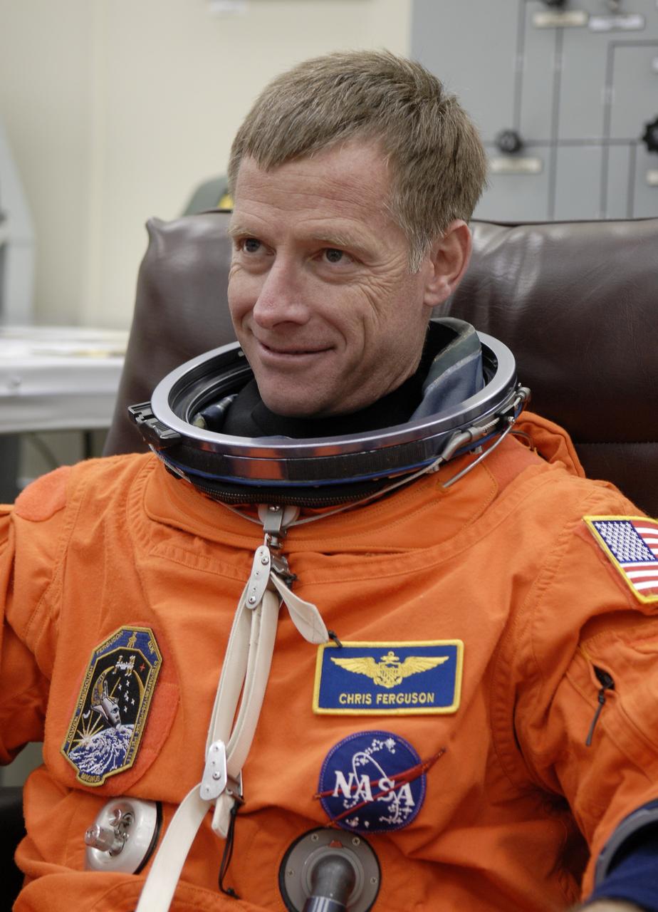 CAPE CANAVERAL, Fla. – Crew members for space shuttle Endeavour's STS-126 mission put on their launch and entry suits before heading to Launch Pad 39A at NASA's Kennedy Space Center in Florida. Commander Chris Ferguson is making his second shuttle flight. STS-126 is the 124th space shuttle flight and the 27th flight to the International Space Station. The mission will feature four spacewalks and work that will prepare the space station to house six crew members for long- duration missions. Liftoff is scheduled for 7:55 p.m. EST Nov. 14. Photo credit: NASA/Kim Shiflett