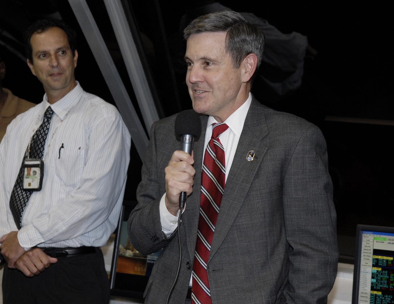 CAPE CANAVERAL, Fla. – In the Firing Room of the Launch Control Center at NASA's Kennedy Space Center in Florida, Center Director Bob Cabana congratulations the launch team for the successful launch of space shuttle Endeavour on the STS-126 mission. Liftoff was on time at 7:55 p.m. EST. STS-126 is the 124th space shuttle flight and the 27th flight to the International Space Station. The mission will feature four spacewalks and work that will prepare the space station to house six crew members for long-duration missions.  Photo credit: NASA/Kim Shiflett