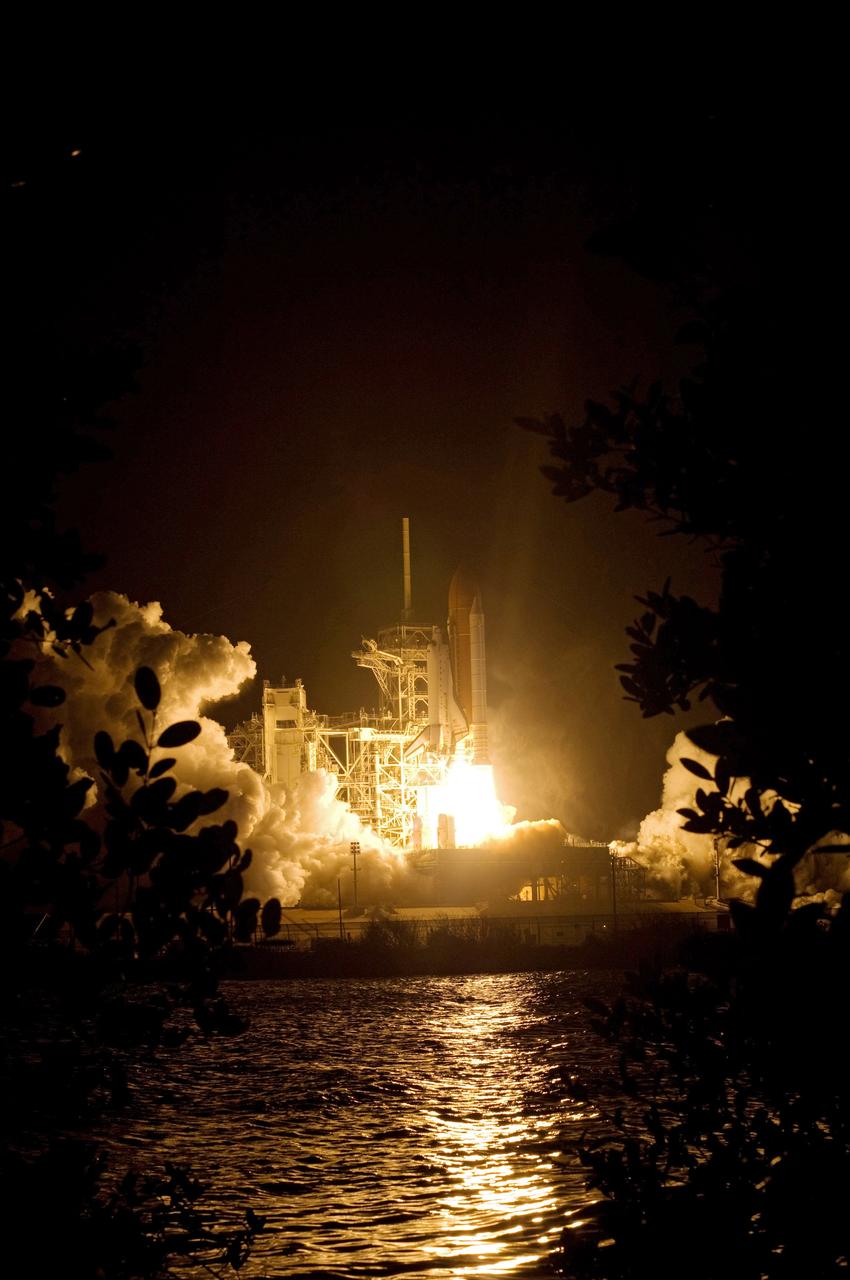 CAPE CANAVERAL, Fla. – Blazing light surrounds Launch Pad 39A and glows in the nearby water at NASA's Kennedy Space Center in Florida as space shuttle Endeavour leaps into the sky on the STS-126 mission. Liftoff was on time at 7:55 p.m. EST. STS-126 is the 124th space shuttle flight and the 27th flight to the International Space Station. The mission will feature four spacewalks and work that will prepare the space station to house six crew members for long-duration missions. Photo credit: NASA/Sandra Joseph-Kevin O'Connell