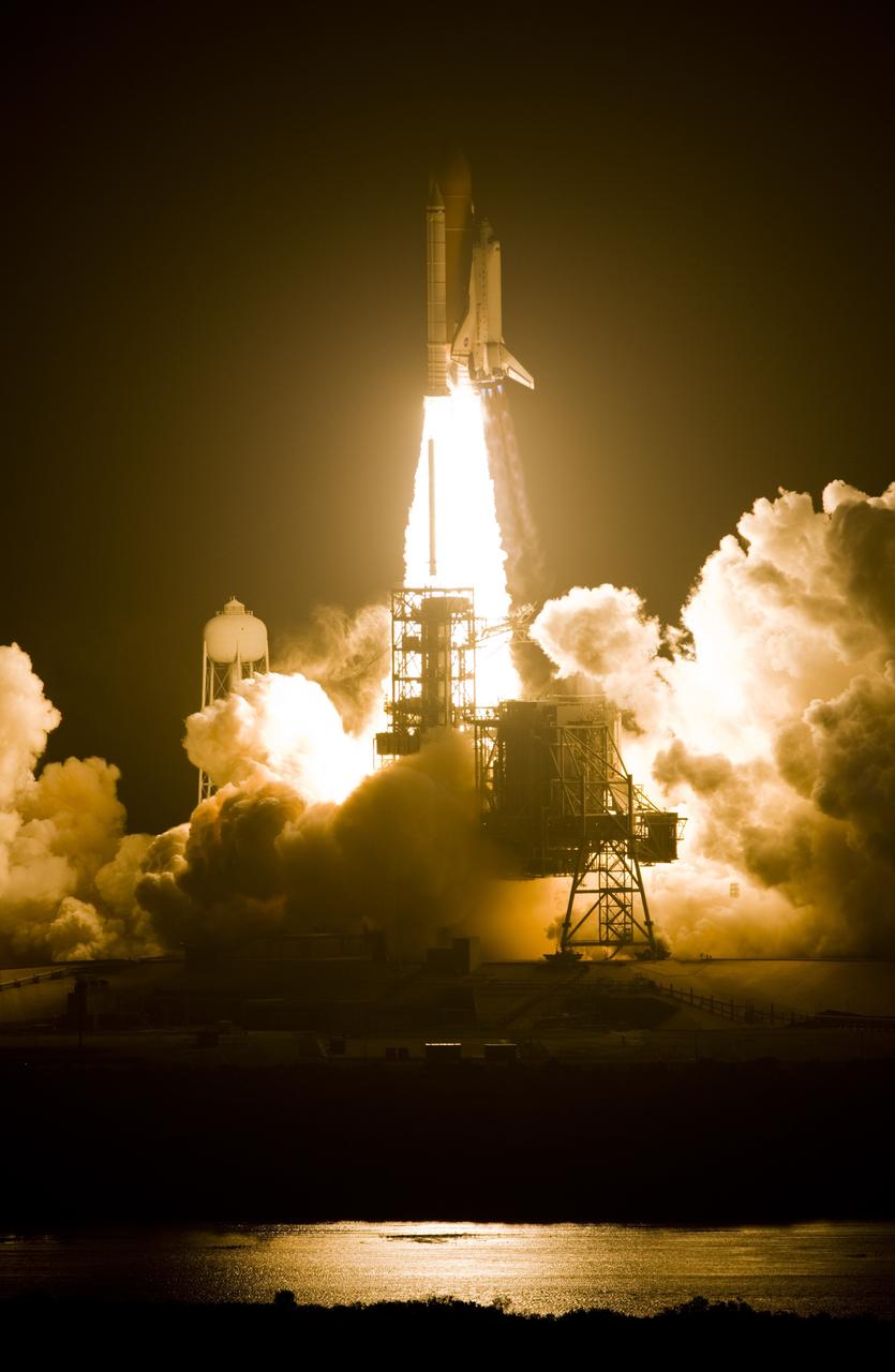CAPE CANAVERAL, Fla. – From Launch Pad 39A at NASA's Kennedy Space Center, space shuttle Endeavour roars into space atop twin columns of fire, lighting the night sky, Liftoff of Endeavour on the STS-126 mission was on time at 7:55 p.m. EST. STS-126 is the 124th space shuttle flight and the 27th flight to the International Space Station. The mission will feature four spacewalks and work that will prepare the space station to house six crew members for long-duration missions. Photo courtesy of Scott Andrews