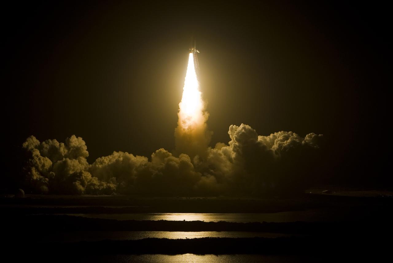 CAPE CANAVERAL, Fla. – Space shuttle Endeavour punches a hole in the dark of night as it hurtles into the sky atop a column of fire on the STS-126 mission. Liftoff from Launch Pad 39A at NASA's Kennedy Space Center was on time at 7:55 p.m. EST. STS-126 is the 124th space shuttle flight and the 27th flight to the International Space Station. The mission will feature four spacewalks and work that will prepare the space station to house six crew members for long-duration missions. Photo courtesy of Scott Andrews