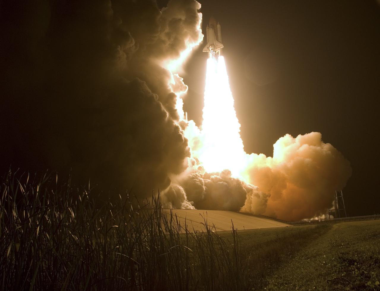 CAPE CANAVERAL, Fla. – Twin columns light the night sky as space shuttle Endeavour hurtles into space on the STS-126 mission.  Liftoff was on time at 7:55 p.m. EST.  STS-126 is the 124th space shuttle flight and the 27th flight to the International Space Station. The mission will feature four spacewalks and work that will prepare the space station to house six crew members for long-duration missions.  Photo credit: NASA/Sandra Joseph-Kevin O'Connell