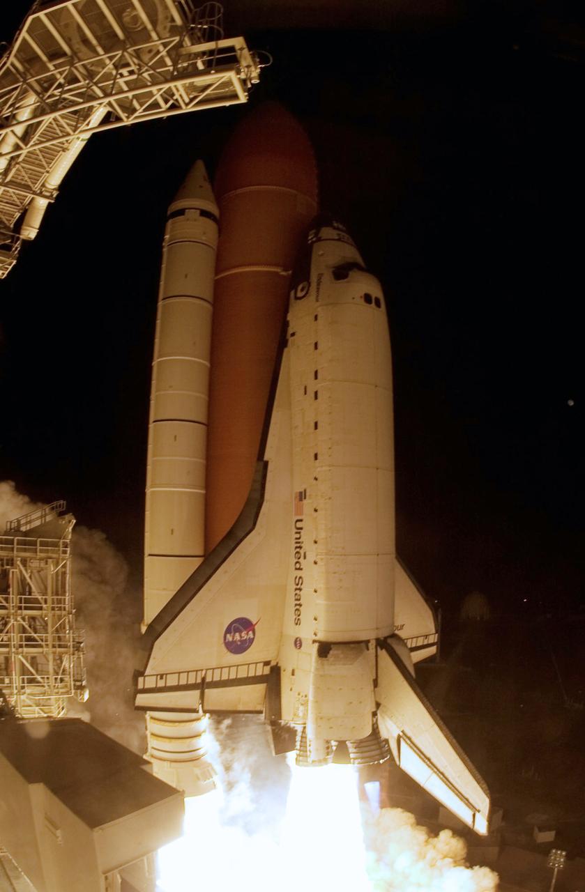 CAPE CANAVERAL, Fla. – On Launch Pad 39A at NASA's Kennedy Space Center, space shuttle Endeavour roars into the night sky on the STS-126 mission.  Blue cones of light, the shock or mach diamonds that are a formation of shock waves in the exhaust plume of an aerospace propulsion system can be seen beneath the nozzles of the main engines.   Liftoff was on time at 7:55 p.m. EST. STS-126 is the 124th space shuttle flight and the 27th flight to the International Space Station. The mission will feature four spacewalks and work that will prepare the space station to house six crew members for long-duration missions. Photo credit: NASA/Sandra Joseph-Kevin O'Connell