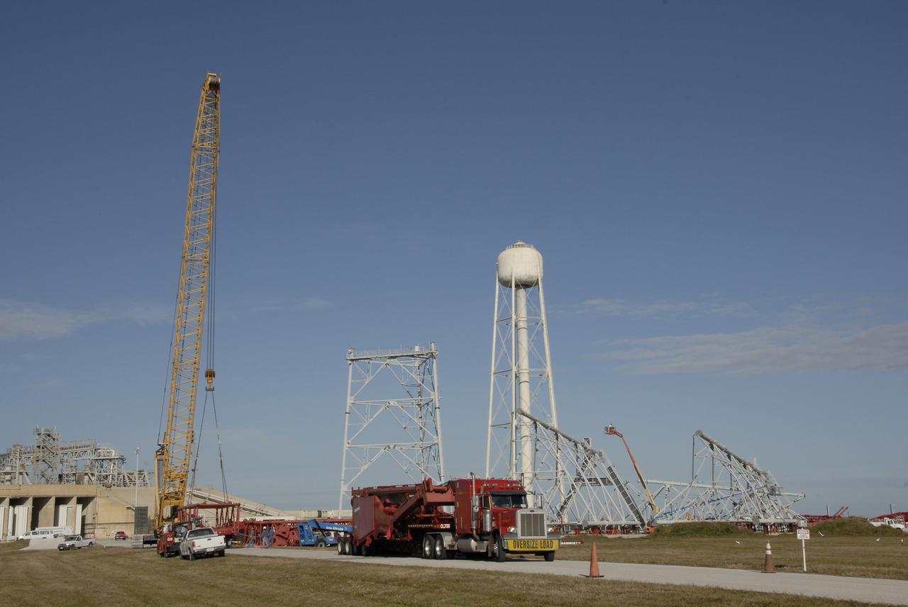 CAPE CANAVERAL, Fla. – On Launch Pad 39B at NASA's Kennedy Space Center in Florida, a giant crane is under construction to help finish erecting the lightning towers on the pad. The crane segments arrived on 125 trucks. Lightning towers are being constructed to hold catenary wires as part of the new lightning protection system for the Constellation Program and Ares/Orion launches. Photo credit: NASA/Kim Shiflett