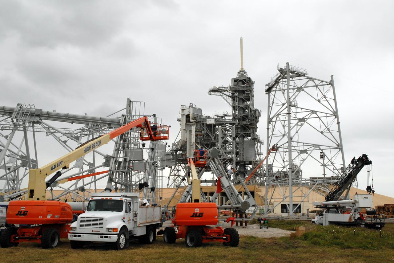 CAPE CANAVERAL, Fla. - On Launch Pad 39B at NASA’s Kennedy Space Center in Florida, equipment is on hand to continue erecting the lightning towers. Each of the three new lightning towers will be 500 feet tall with an additional 100-foot fiberglass mast atop supporting a wire centenary system.  This improved lightning protection system allows for the taller height of the Ares I compared to the space shuttle.  Pad B will be the site of the first Ares vehicle launch, including Ares I-X which is targeted for summer of 2009, as part of NASA’s Constellation Program.  Photo credit: NASA/Tim Jacobs