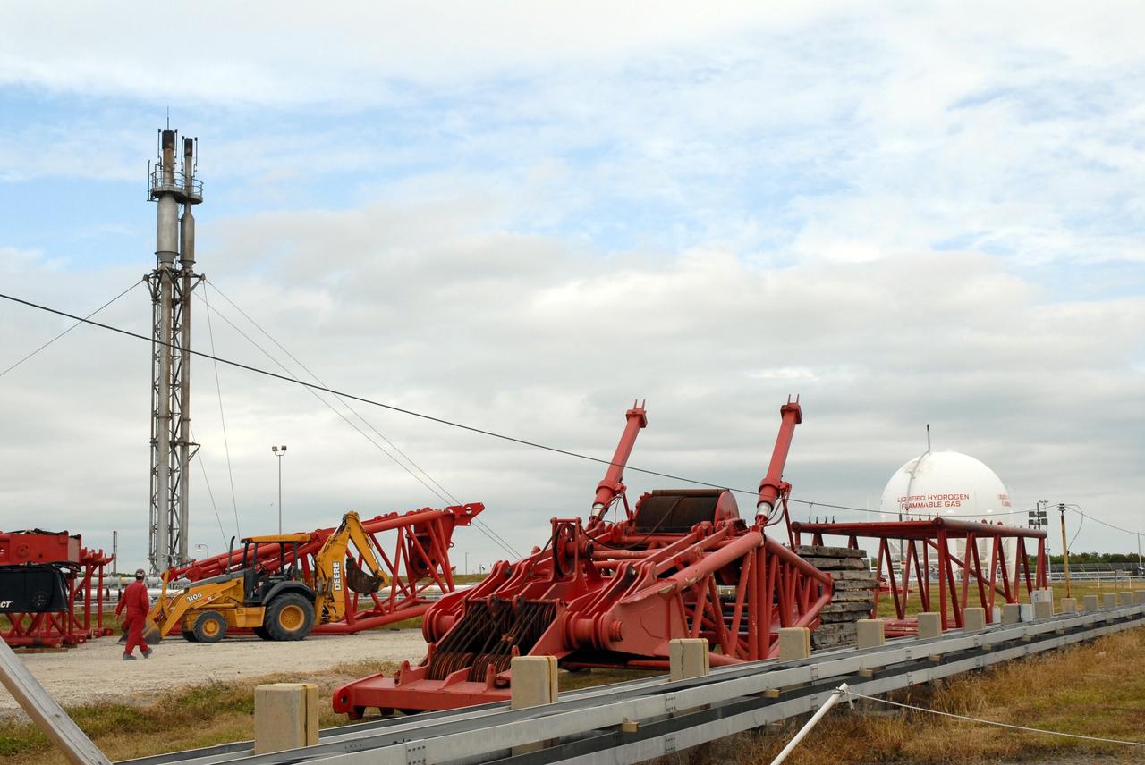 CAPE CANAVERAL, Fla. - The new lightning towers are under construction on Launch Pad 39B at NASA’s Kennedy Space Center in Florida.  Each of the three new lightning towers will be 500 feet tall with an additional 100-foot fiberglass mast atop supporting a wire centenary system.  This improved lightning protection system allows for the taller height of the Ares I compared to the space shuttle.  Pad B will be the site of the first Ares vehicle launch, including Ares I-X which is targeted for summer of 2009, as part of NASA’s Constellation Program.  Photo credit: NASA/Tim Jacobs