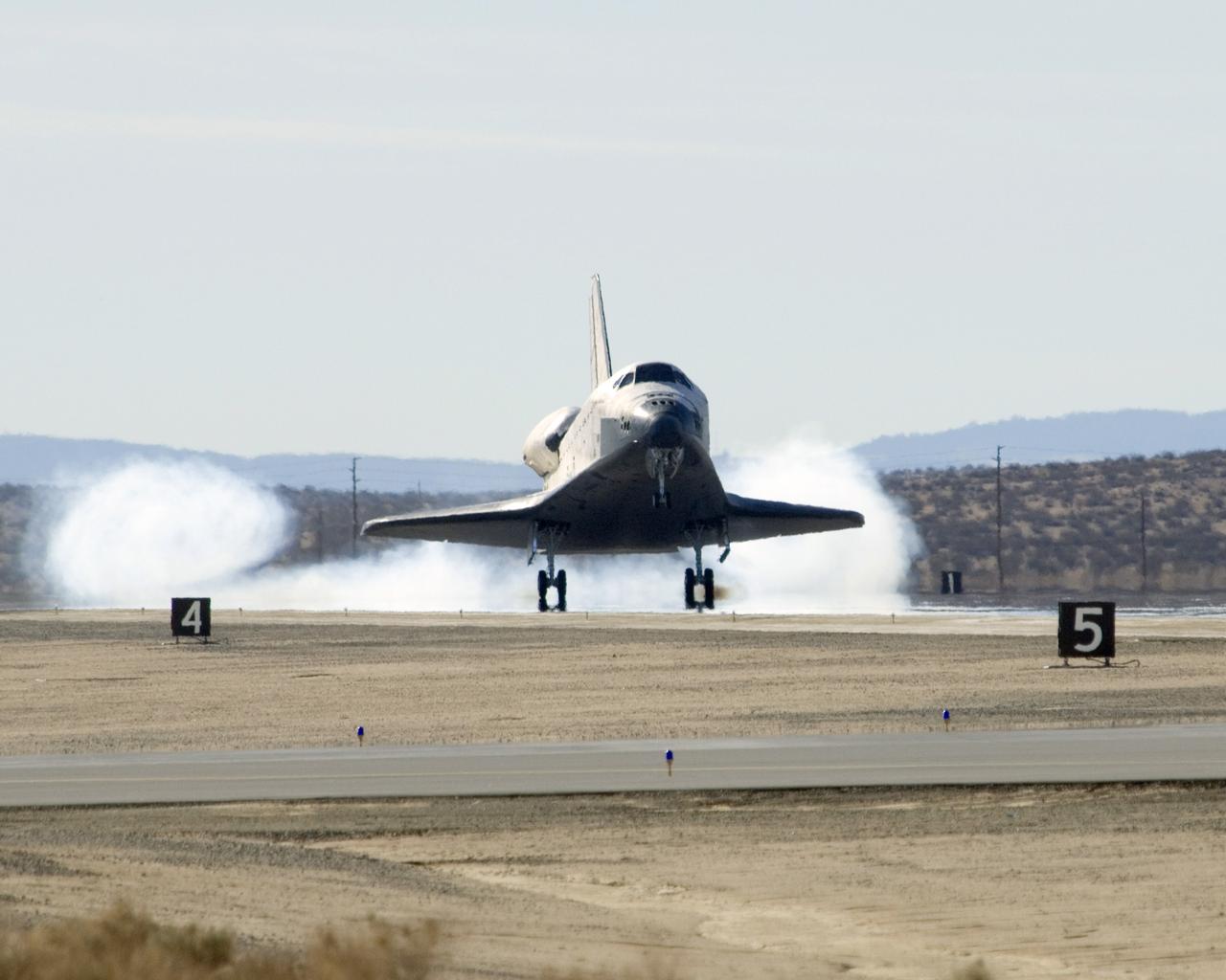 EDWARDS, Calif. –- Space shuttle Endeavour kicks up dust as it touches down at Edwards Air Force Base in California at 4:25 p.m. EST to end the STS-126 mission, completing its 16-day journey of over 6.6 million miles in space. The main landing gear touched down at 4:25:06 p.m. EST. The nose landing gear touched down at 4:25:21 p.m. and wheel stop was at 4:26:03 p.m. The STS-126 mission was the 27th flight to the International Space Station, carrying equipment and supplies in the Multi-Purpose Logistics Module Leonardo. The mission featured four spacewalks and work to prepare the space station to house six crew members for long-duration missions.  Photo credit: NASA/ Tony Landis, EAFB