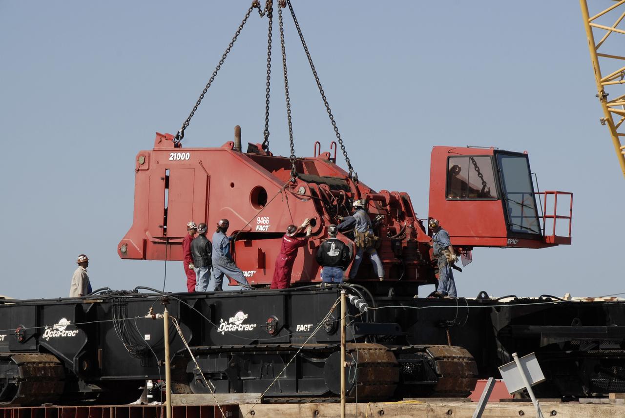 CAPE CANAVERAL, Fla. --  On Launch Pad 39B at NASA’s Kennedy Space Center in Florida, equipment is moved that will be used to continue erecting the lightning towers. Each of the three new lightning towers will be 500 feet tall with an additional 100-foot fiberglass mast atop supporting a wire catenary system. This improved lightning protection system allows for the taller height of the Ares I compared to the space shuttle. Pad B will be the site of the first Ares vehicle launch, including Ares I-X which is targeted for summer of 2009, as part of NASA’s Constellation Program. Photo credit: NASA/Kim Shiflett
