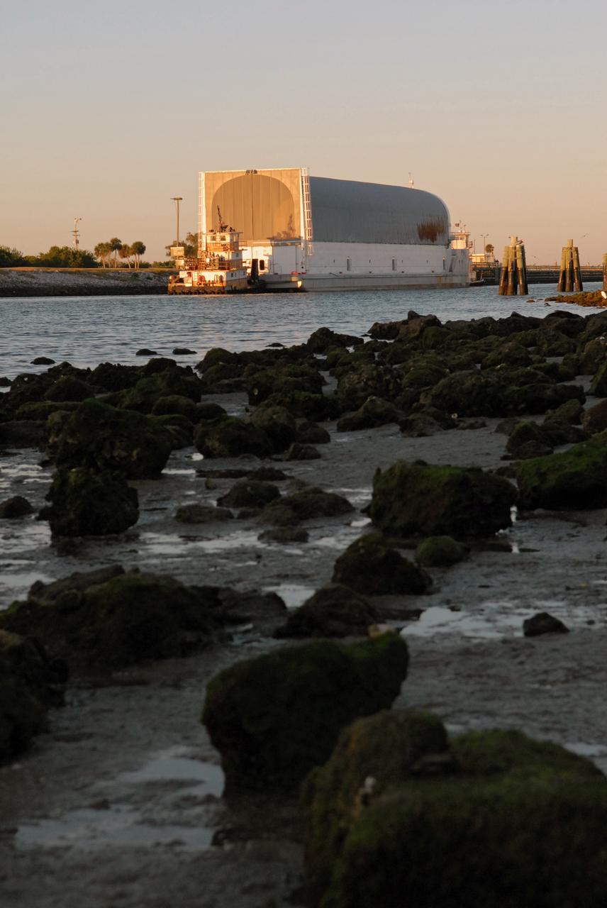 CAPE CANAVERAL, Fla. -- The Pegasus barge carrying external tank 130 moves up the Banana River in Florida after an ocean voyage towed by a solid rocket booster retrieval ship from NASA's Michoud Assembly Facility near New Orleans. Pegasus will continue to the turn basin near the Vehicle Assembly Building, or VAB, at NASA's Kennedy Space Center in Florida. After the Pegasus docks, the fuel tank will be offloaded and transported to the VAB. External tank 130 is the one designated for space shuttle Endeavour on the STS-127 mission targeted for launch on May 15. Photo credit: NASA/Troy Cryder