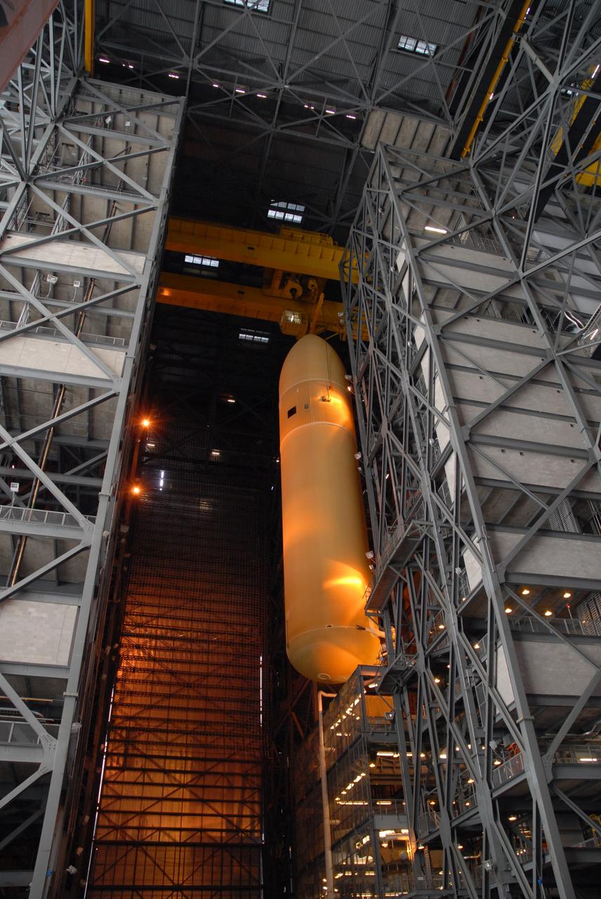 CAPE CANAVERAL, Fla. --  Suspended by a crane in the Vehicle Assembly Building at NASA's Kennedy Space Center in Florida, external fuel tank 130 is moved into high bay 2 for checkout before stacking with the solid rocket boosters and space shuttle Atlantis for the STS-125 mission. The fuel tank was previously designated for the STS-127 mission. The STS-125 Hubble servicing mission  is targeted to launch May 12.  Photo credit: NASA/Tim Jacobs