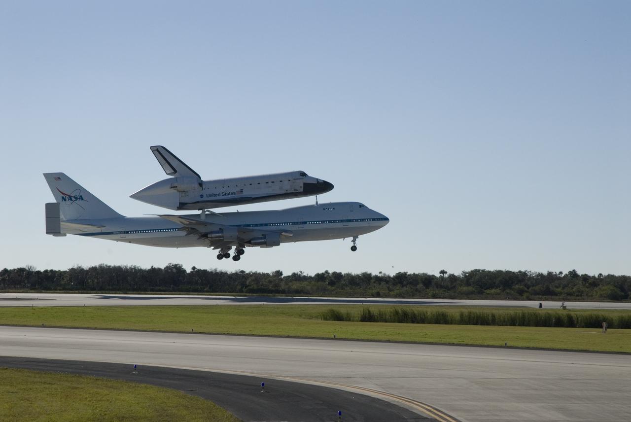 CAPE CANAVERAL, Fla. --   After a three-day trip from California, the shuttle carrier aircraft, or SCA, and its piggyback passenger space shuttle Endeavour are ready to land on the Shuttle Landing Facility runway at NASA's Kennedy Space Center in Florida. Visible on Endeavour is the tail cone, which covers and protects the main engines during the ferry flight.   Touchdown at Kennedy was at 2:44 p.m. EST. The SCA is a modified Boeing 747 jetliner. Endeavour landed at Edwards Air Force Base in California Nov. 30 to end mission STS-126. The return to Kennedy began Dec. 8 and took four days after stops across the country for fuel. The last stop was at Barksdale Air Force Base in Shreveport, La.  Weather conditions en route and in Florida postponed the landing at Kennedy until Dec. 12. Photo credit: NASA/Tim Jacobs