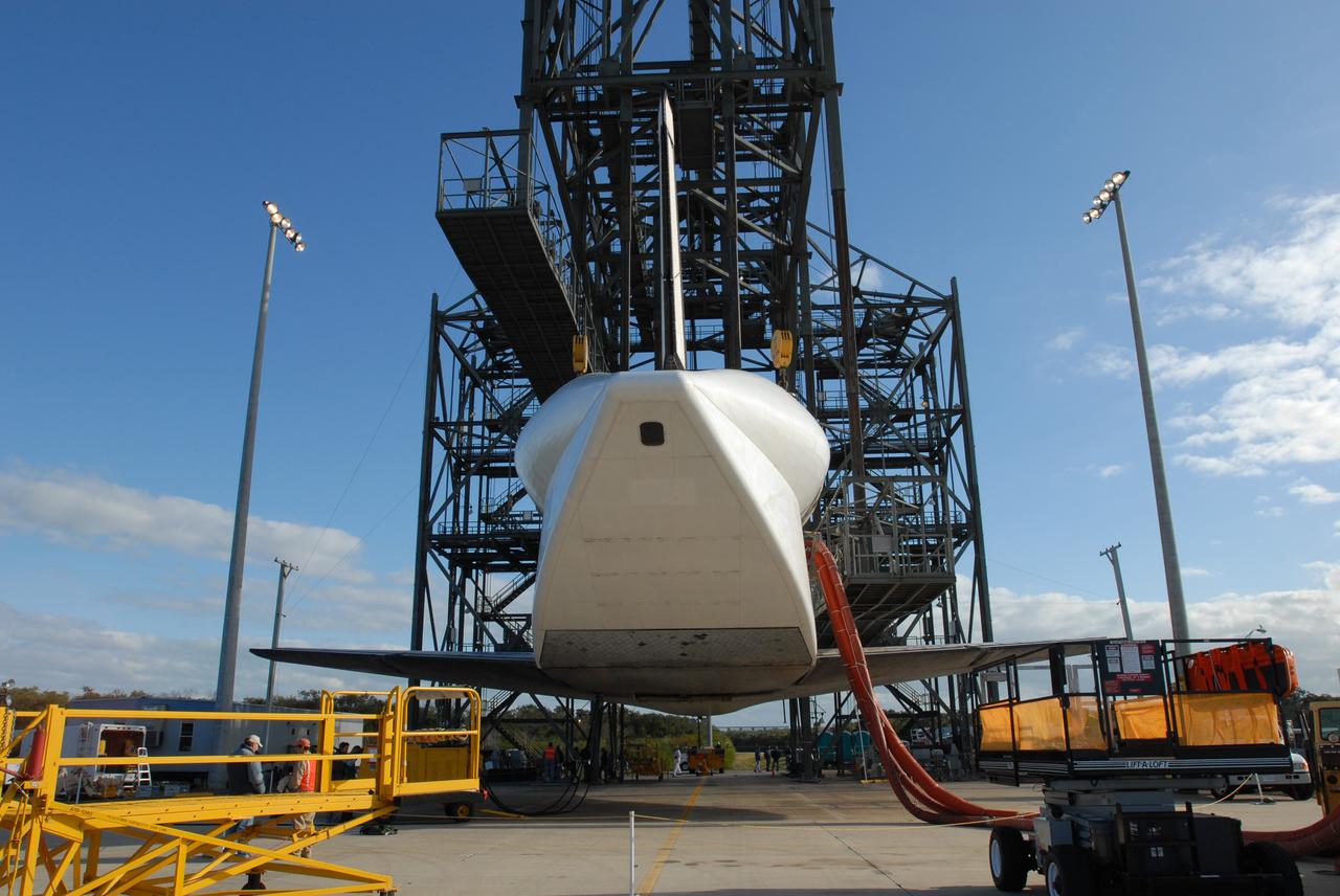 CAPE CANAVERAL, Fla. --   After sunrise, at the Shuttle Landing Facility, or SLF, at NASA's Kennedy Space Center in Florida, space shuttle Endeavour is prepared for its move to the Orbiter Processing Facility. Endeavour will be towed via the two-mile tow-way from the SLF by a diesel-powered tractor to the Orbiter Processing Facility where it will begin preparations for its next mission, STS-127, targeted for May 2009. Photo credit: NASA/Jim Grossmann
