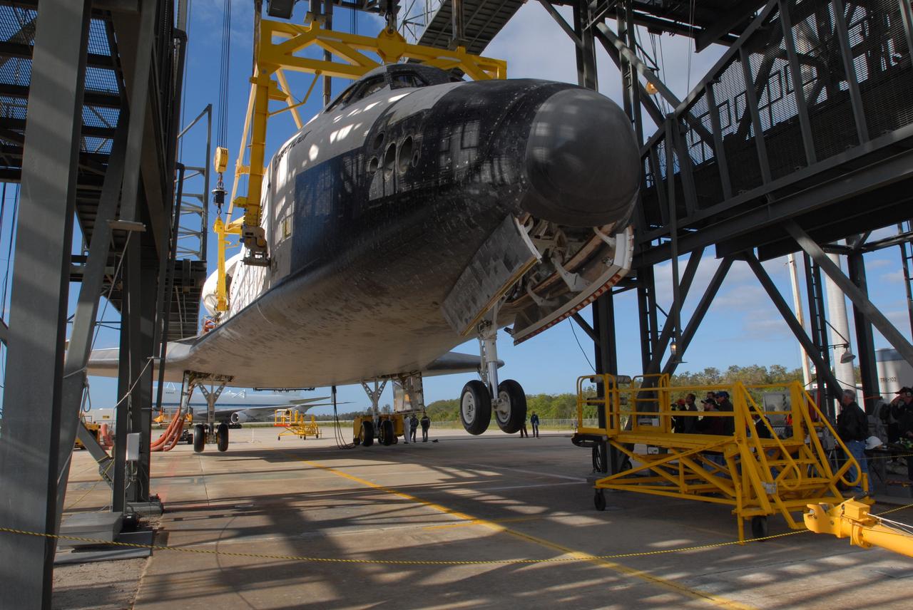 CAPE CANAVERAL, Fla. -- After sunrise, at the Shuttle Landing Facility, or SLF, at NASA's Kennedy Space Center in Florida, the wheels on space shuttle Endeavour are lowered before its move to the Orbiter Processing Facility. Endeavour will be towed via the two-mile tow-way from the SLF by a diesel-powered tractor to the Orbiter Processing Facility where it will begin preparations for its next mission, STS-127, targeted for May 2009. Photo credit: NASA/Jim Grossmann