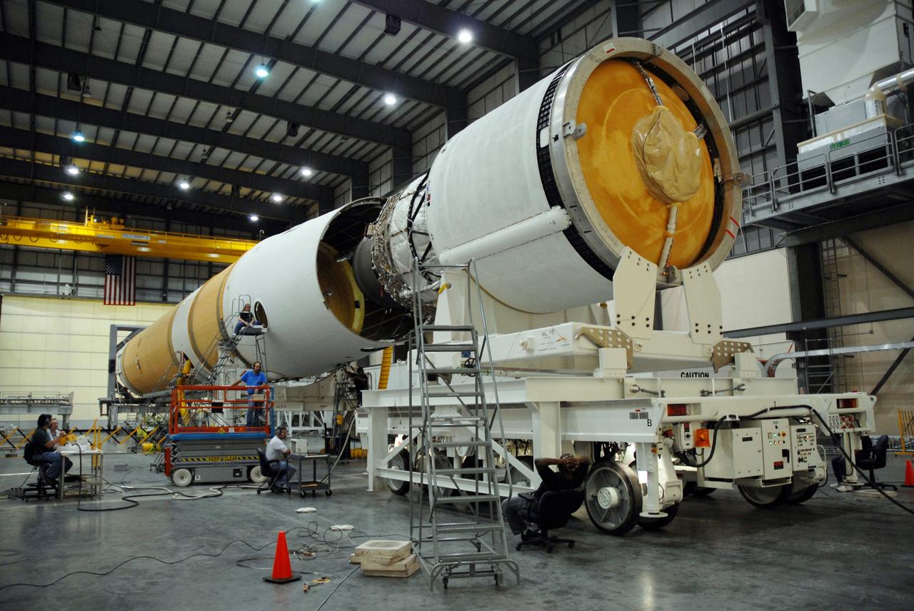 CAPE CANAVERAL, Fla. --  The GOES-O/Delta IV second stage is being mated to the first stage in the Horizontal Integration Facility on Complex 37 at Cape Canaveral Air Force Station in Florida. GOES–O is one of a series of Geostationary Operational Environmental Satellites. The multi-mission GOES series N-P will be a vital contributor to weather, solar and space operations and science. NASA and the National Oceanic and Atmospheric Administration, or NOAA, are actively engaged in a cooperative program to expand the existing GOES system with the launch of the GOES N-P satellites.  Launch of the GOES-O is targeted for no earlier than April 2009.  Photo credit: NASA/Jack Pfaller