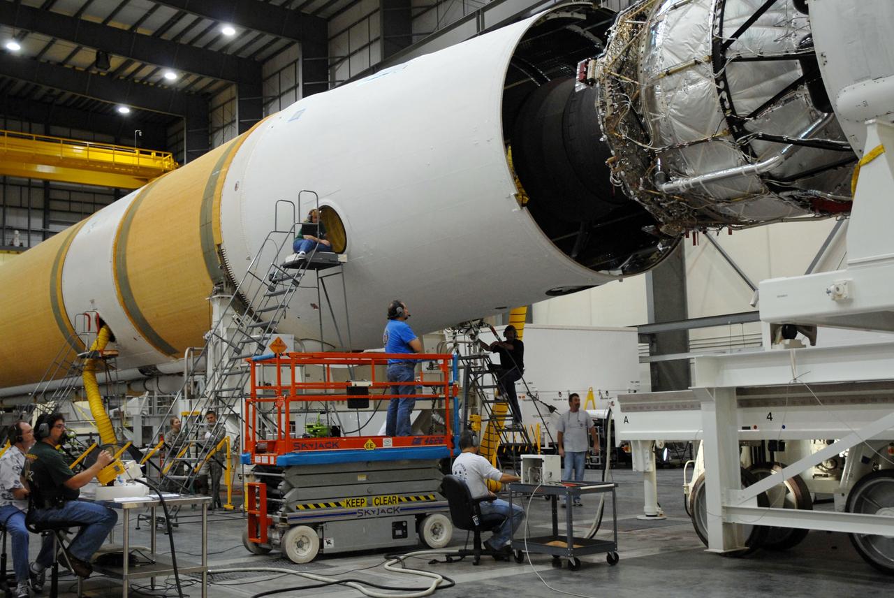 CAPE CANAVERAL, Fla. --  The GOES-O/Delta IV second stage is being mated to the first stage in the Horizontal Integration Facility on Complex 37 at Cape Canaveral Air Force Station in Florida. GOES–O is one of a series of Geostationary Operational Environmental Satellites. The multi-mission GOES series N-P will be a vital contributor to weather, solar and space operations and science. NASA and the National Oceanic and Atmospheric Administration, or NOAA, are actively engaged in a cooperative program to expand the existing GOES system with the launch of the GOES N-P satellites.  Launch of the GOES-O is targeted for no earlier than April 2009.  Photo credit: NASA/Jack Pfaller