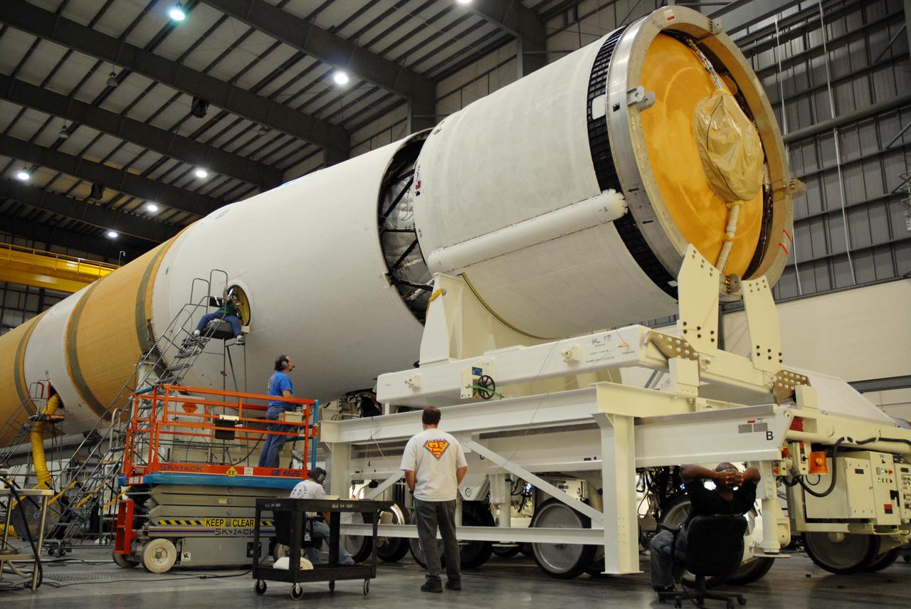 CAPE CANAVERAL, Fla. --  The GOES-O/Delta IV second stage is being mated to the first stage in the Horizontal Integration Facility on Complex 37 at Cape Canaveral Air Force Station in Florida. GOES–O is one of a series of Geostationary Operational Environmental Satellites. The multi-mission GOES series N-P will be a vital contributor to weather, solar and space operations and science. NASA and the National Oceanic and Atmospheric Administration, or NOAA, are actively engaged in a cooperative program to expand the existing GOES system with the launch of the GOES N-P satellites.  Launch of the GOES-O is targeted for no earlier than April 2009.  Photo credit: NASA/Jack Pfaller