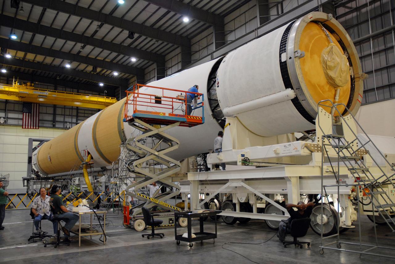 CAPE CANAVERAL, Fla. -- The GOES-O/Delta IV second stage is being mated to the first stage in the Horizontal Integration Facility on Complex 37 at Cape Canaveral Air Force Station in Florida. GOES–O is one of a series of Geostationary Operational Environmental Satellites. The multi-mission GOES series N-P will be a vital contributor to weather, solar and space operations and science. NASA and the National Oceanic and Atmospheric Administration, or NOAA, are actively engaged in a cooperative program to expand the existing GOES system with the launch of the GOES N-P satellites. Launch of the GOES-O is targeted for no earlier than April 2009. Photo credit: NASA/Jack Pfaller