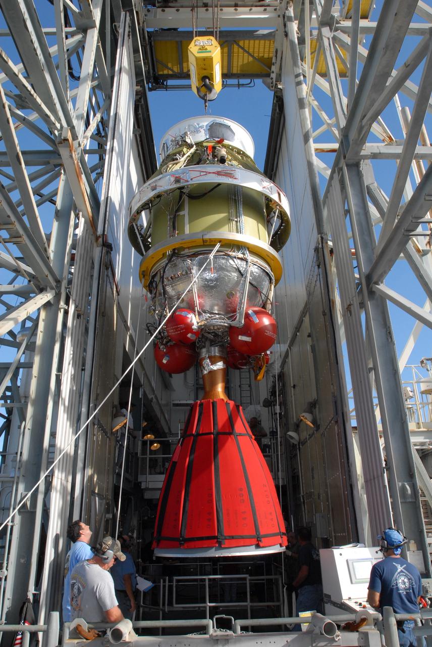 CAPE CANAVERAL, Fla. -- On Complex 17-B at Cape Canaveral Air Force Station in Florida, the second stage of the Delta 2 rocket for the launch of NASA's Kepler spacecraft is moved inside the mobile service tower. In the tower, the second stage will be mated to the first stage of the Delta 2. The Kepler mission is specifically designed to survey our region of the Milky Way galaxy to discover hundreds of Earth-size and smaller planets in or near the habitable zone and determine how many of the billions of stars in our galaxy have such planets. Results from this mission will allow us to place our solar system within the continuum of planetary systems in the Galaxy. NASA's planet-hunting Kepler mission is scheduled to launch no earlier than March 5, 2009. Photo credit: NASA/Jim Grossmann