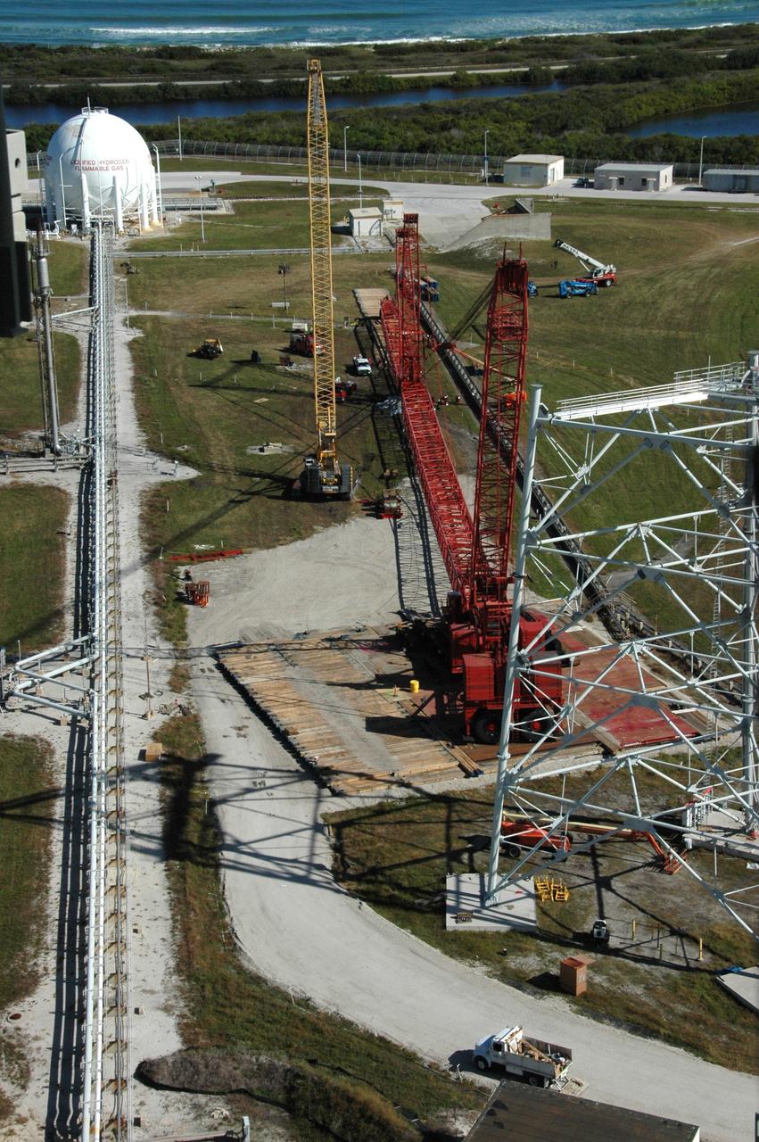 CAPE CANAVERAL, Fla. -- Very large cranes are being constructed on Launch Pad 39B at NASA's Kennedy Space Center in Florida to aid in erecting the lightning towers to hold catenary wires as part of the new lightning protection system for the Constellation Program and Ares/Orion launches. Pad 39B will be the site of the first Ares vehicle launch, including Ares I-X test flight that is targeted for July 2009. Photo credit: NASA/Tim Jacobs
