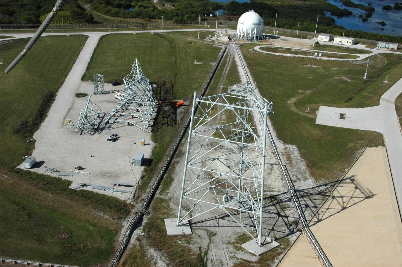 CAPE CANAVERAL, Fla. -- On Launch Pad 39B at NASA's Kennedy Space Center in Florida, one of the new lightning towers is under construction.  The towers will hold catenary wires as part of the new lightning protection system for the Constellation Program and Ares/Orion launches. Pad 39B will be the site of the first Ares vehicle launch, including Ares I-X test flight that is targeted for July 2009. Photo credit: NASA/Tim Jacobs