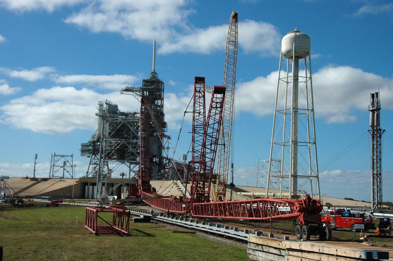 CAPE CANAVERAL, Fla. -- Very large cranes are being constructed on Launch Pad 39B at NASA's Kennedy Space Center in Florida to aid in erecting the lightning towers to hold catenary wires as part of the new lightning protection system for the Constellation Program and Ares/Orion launches. Pad 39B will be the site of the first Ares vehicle launch, including Ares I-X test flight that is targeted for July 2009. Photo credit: NASA/Tim Jacobs