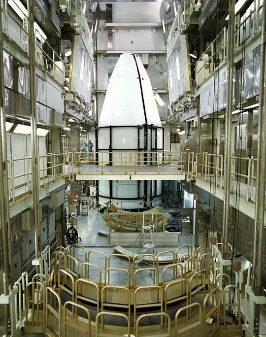The Cassini spacecraft, protected by an environmentally controlled protective fairing, is sitting at Pad 40 at Cape Canaveral Air Station, awaiting its launch scheduled for mid-October atop a Titan IV/Centaur launch vehicle. A four-year, close-up study of the Saturnian system, the Cassini mission will take seven years for the spacecraft to reach Saturn. Scientific instruments carried aboard the spacecraft will study Saturn’s atmosphere, magnetic field, rings, and several moons. NASA’s Jet Propulsion Laboratory is managing the Cassini project
