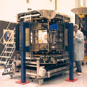 A technician observes the alpha-magnetic spectrometer (AMS-1) after it was removed from its protective shipping case in KSC’s Multi Payload Processing Facility (MPPF). The STS-91 payload arrived at KSC in January and is scheduled to be flown on the 9th and final Mir docking mission, scheduled for launch in May. The objectives of the AMS-1 investigation are to search for anti-matter and dark matter in space and to study astrophysics. The STS-91 flight crew includes Commander Charles Precourt; Pilot Dominic Gorie; and Mission Specialists Wendy B. Lawrence; Franklin Chang-Diaz, Ph.D.; Janet Kavandi, Ph.D.; and Valery Ryumin, with the Russian Space Agency. After docking with the Russian Space Station Mir, Mission Specialist Andrew Thomas, Ph.D., will join the STS-91 crew and return to Earth aboard Discovery