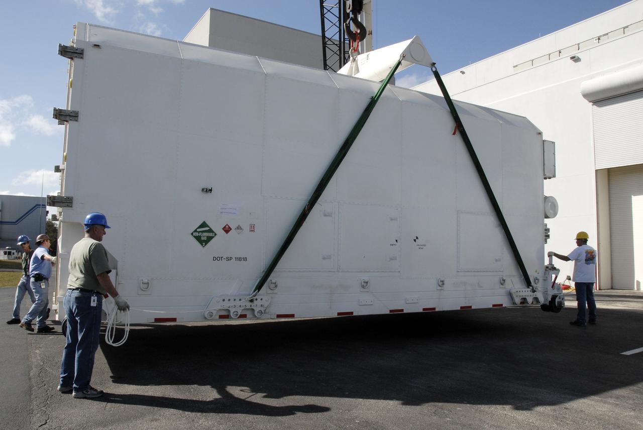 CAPE CANAVERAL, Fla. -- The shipping container holding the Kepler spacecraft is placed on the tarmac outside Astrotech in Titusville, Fla., before being moved inside. A NASA Discovery mission, Kepler is specifically designed to survey our region of the Milky Way galaxy to discover hundreds of Earth-size and smaller planets in or near the habitable zone and determine how many of the billions of stars in our galaxy have such planets. Results from this mission will allow us to place our solar system within the continuum of planetary systems in the Galaxy. The spacecraft will be processed at Astrotech before being carried to its launch pad at Cape Canaveral. .NASA's planet-hunting Kepler mission is scheduled to launch no earlier than March 5, 2009, atop a Delta II rocket. Photo credit: NASA/Kim Shiflett