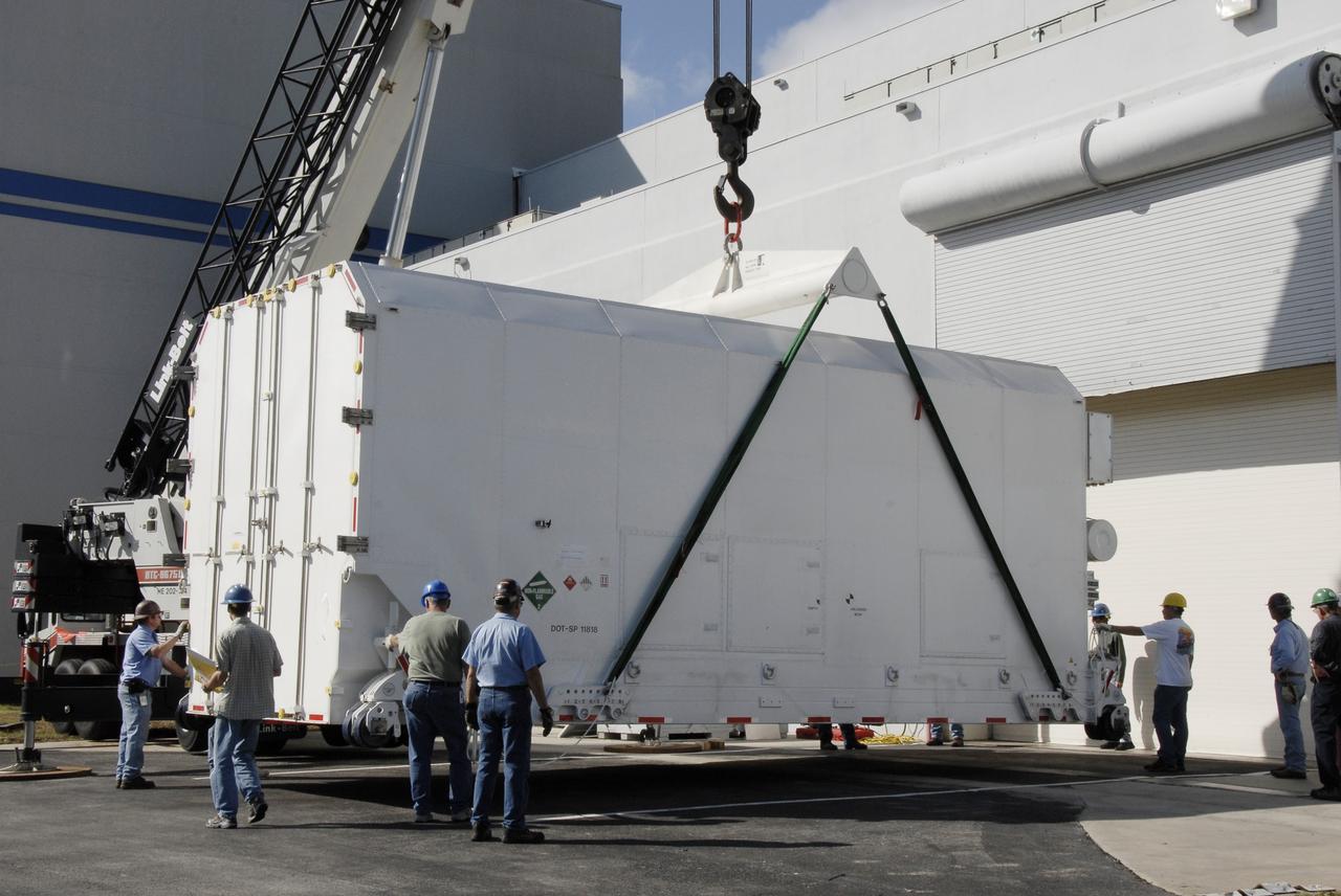CAPE CANAVERAL, Fla. -- The shipping container holding the Kepler spacecraft is placed on the tarmac outside Astrotech in Titusville, Fla., before being moved inside. A NASA Discovery mission, Kepler is specifically designed to survey our region of the Milky Way galaxy to discover hundreds of Earth-size and smaller planets in or near the habitable zone and determine how many of the billions of stars in our galaxy have such planets. Results from this mission will allow us to place our solar system within the continuum of planetary systems in the Galaxy. The spacecraft will be processed at Astrotech before being carried to its launch pad at Cape Canaveral. .NASA's planet-hunting Kepler mission is scheduled to launch no earlier than March 5, 2009, atop a Delta II rocket. Photo credit: NASA/Kim Shiflett